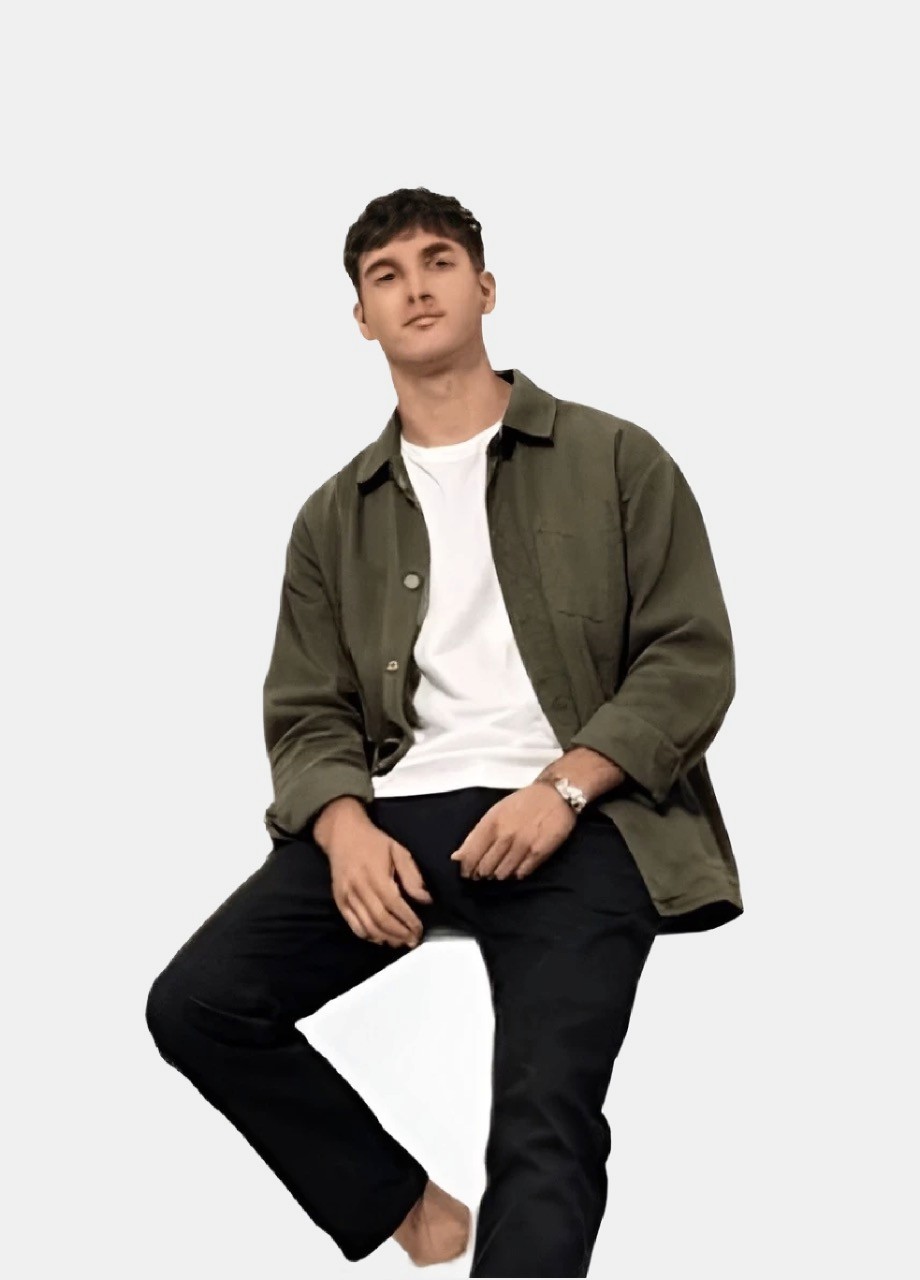 A male person standing on white background