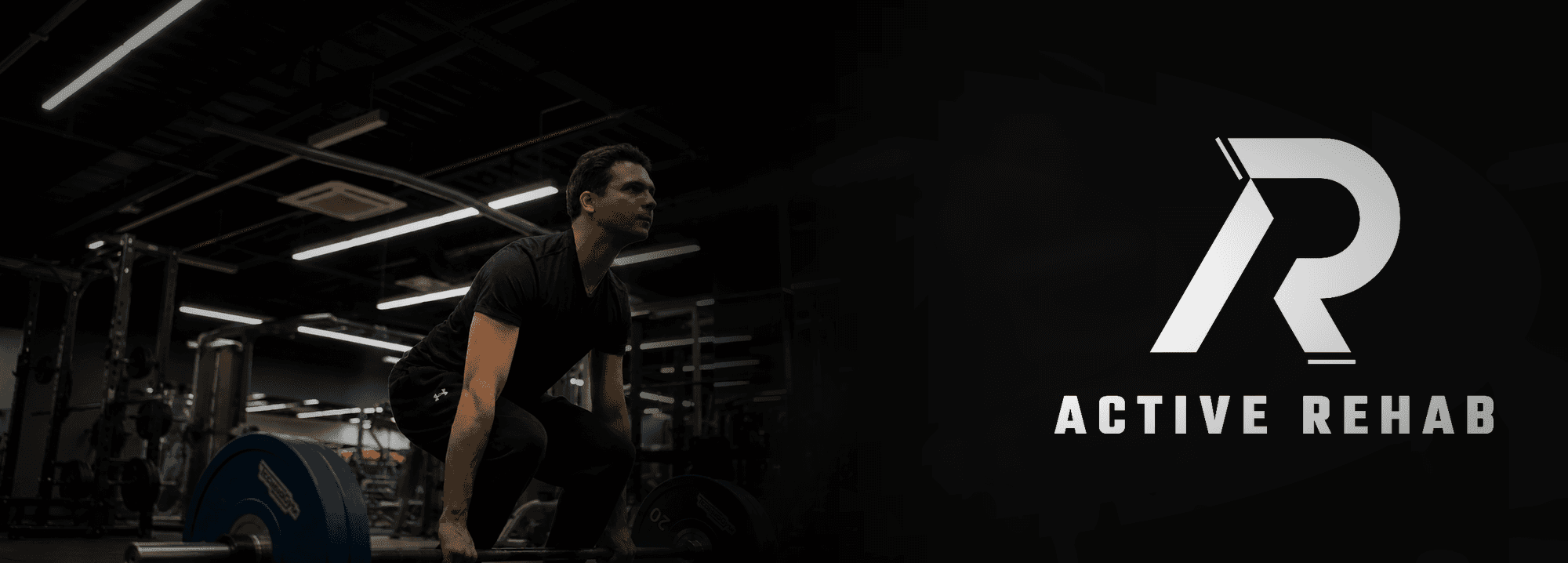 A gym scene featuring several people engaged in various workouts amidst fitness equipment.