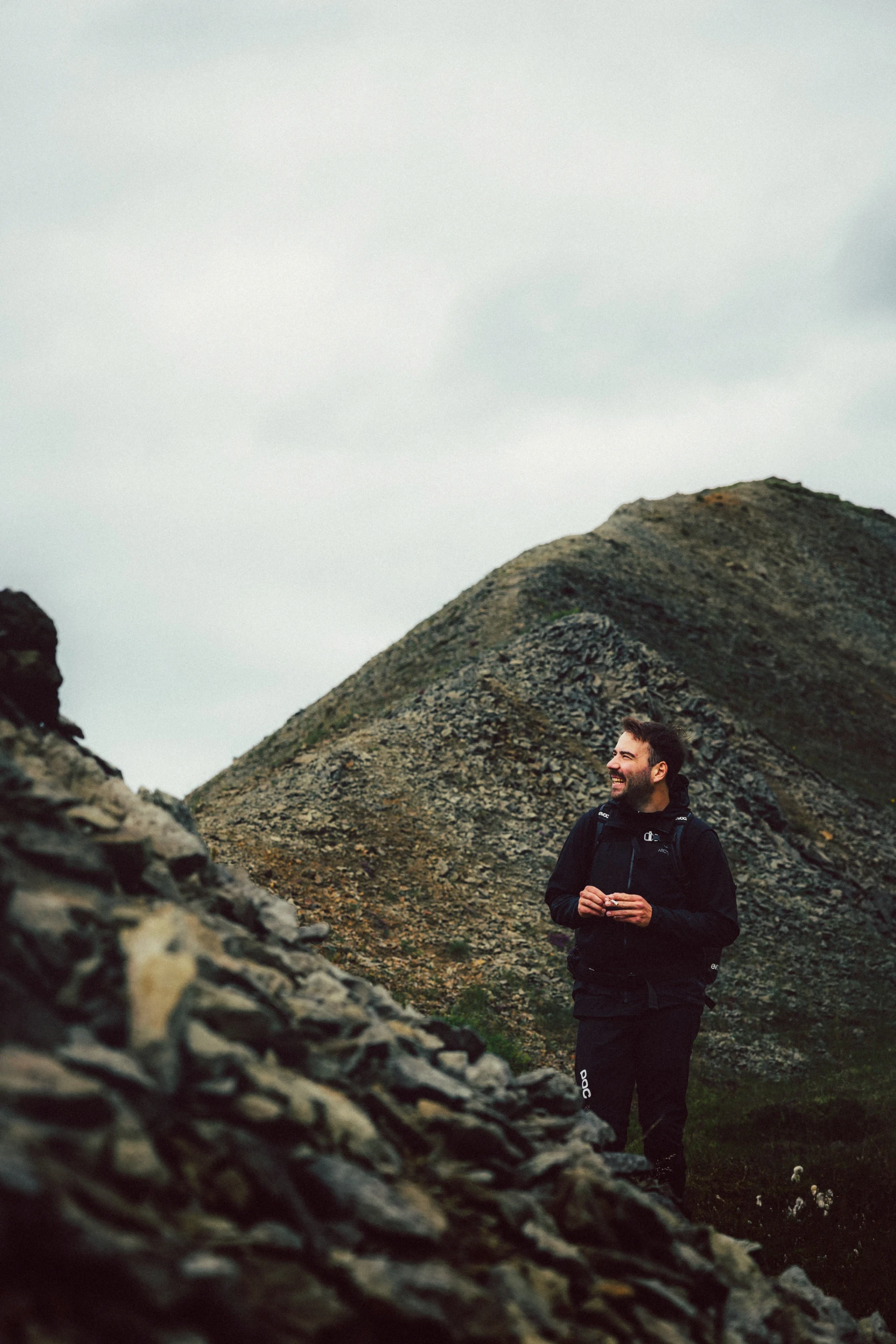 Man in moonscape using camera 