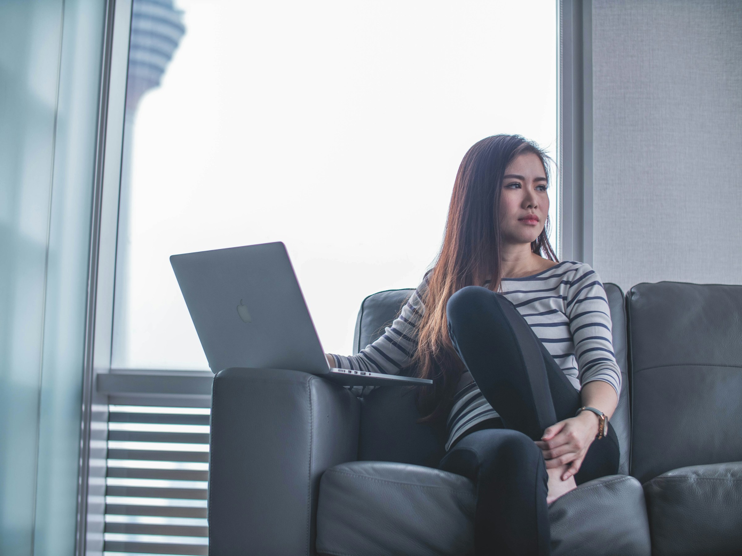 woman with laptop infront of her - Research Graphic Organizer