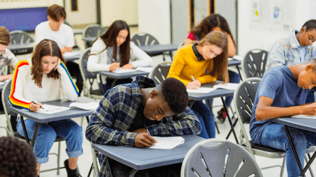 High school students engaged in STEM learning with math equations and tools, highlighting RISE Research summer programs and Ivy League mentorship opportunities.
