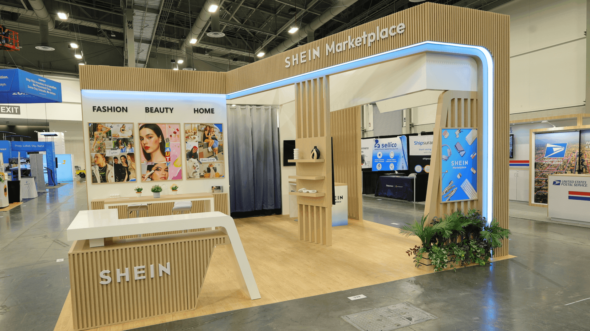 SHEIN Prosper Show 2025 20x20 booth with wood slat exhibit structure, curved lighted frame, front counter, and open aisle-facing retail booth layout