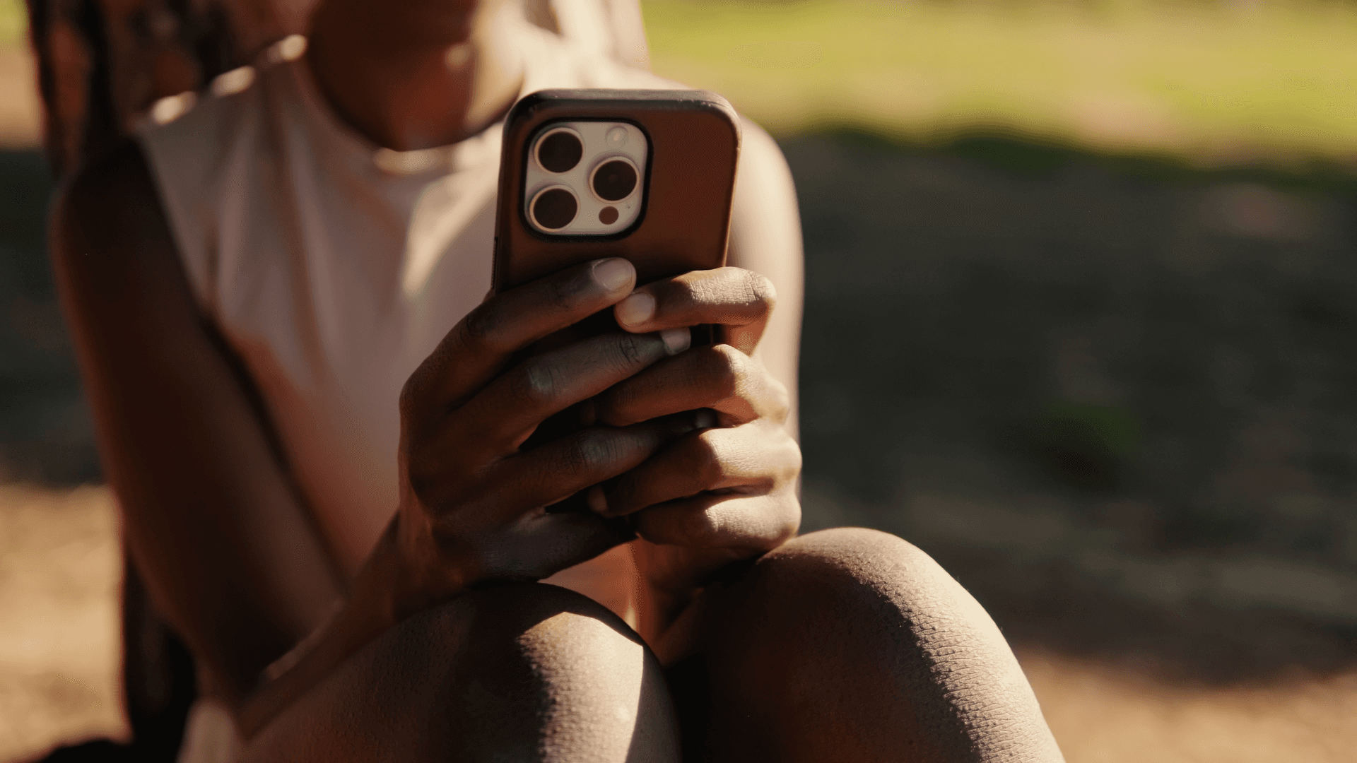 Woman using a phone.