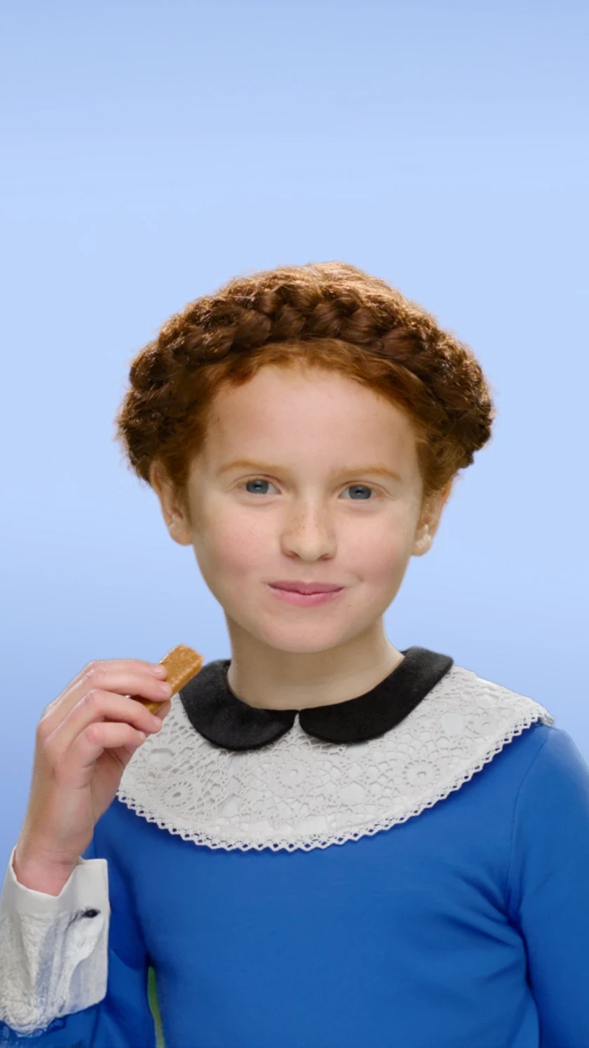 Campagne publicitaire pour Gavottes montrant une enfant déguster un biscuit Gavottes