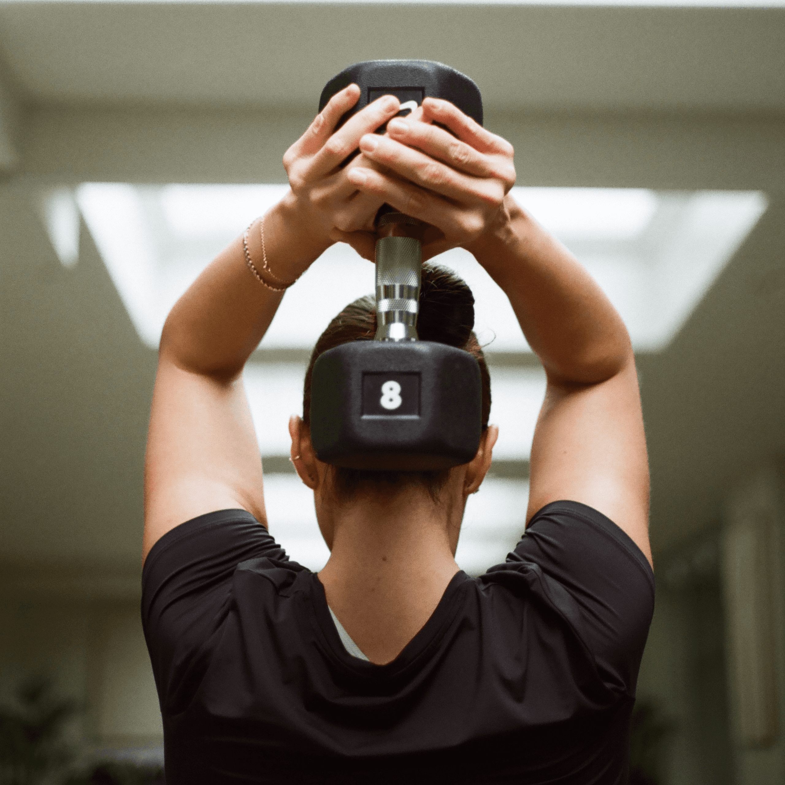 a white couch sitting on top of a white floor