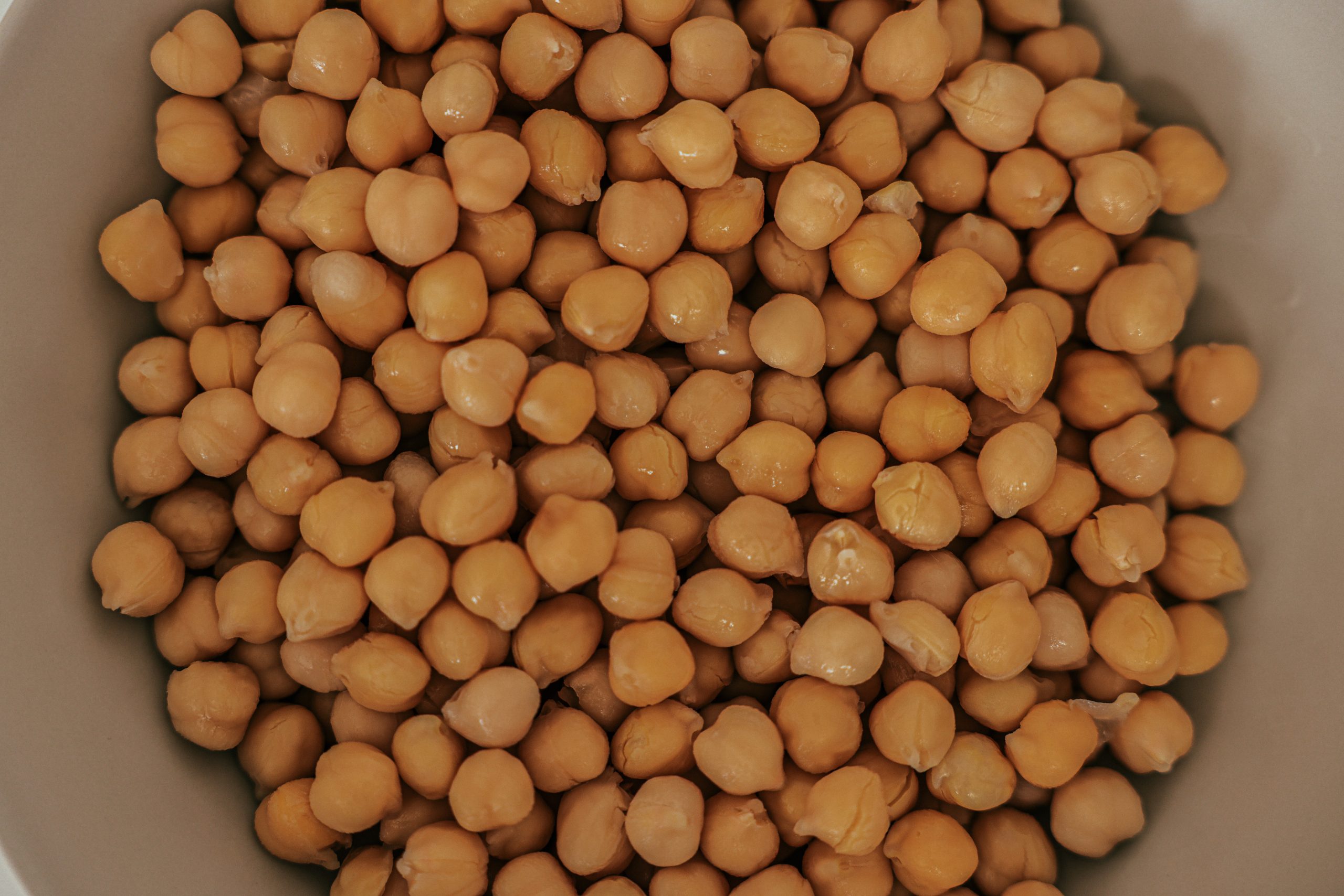 A bowl of fresh chickpeas.