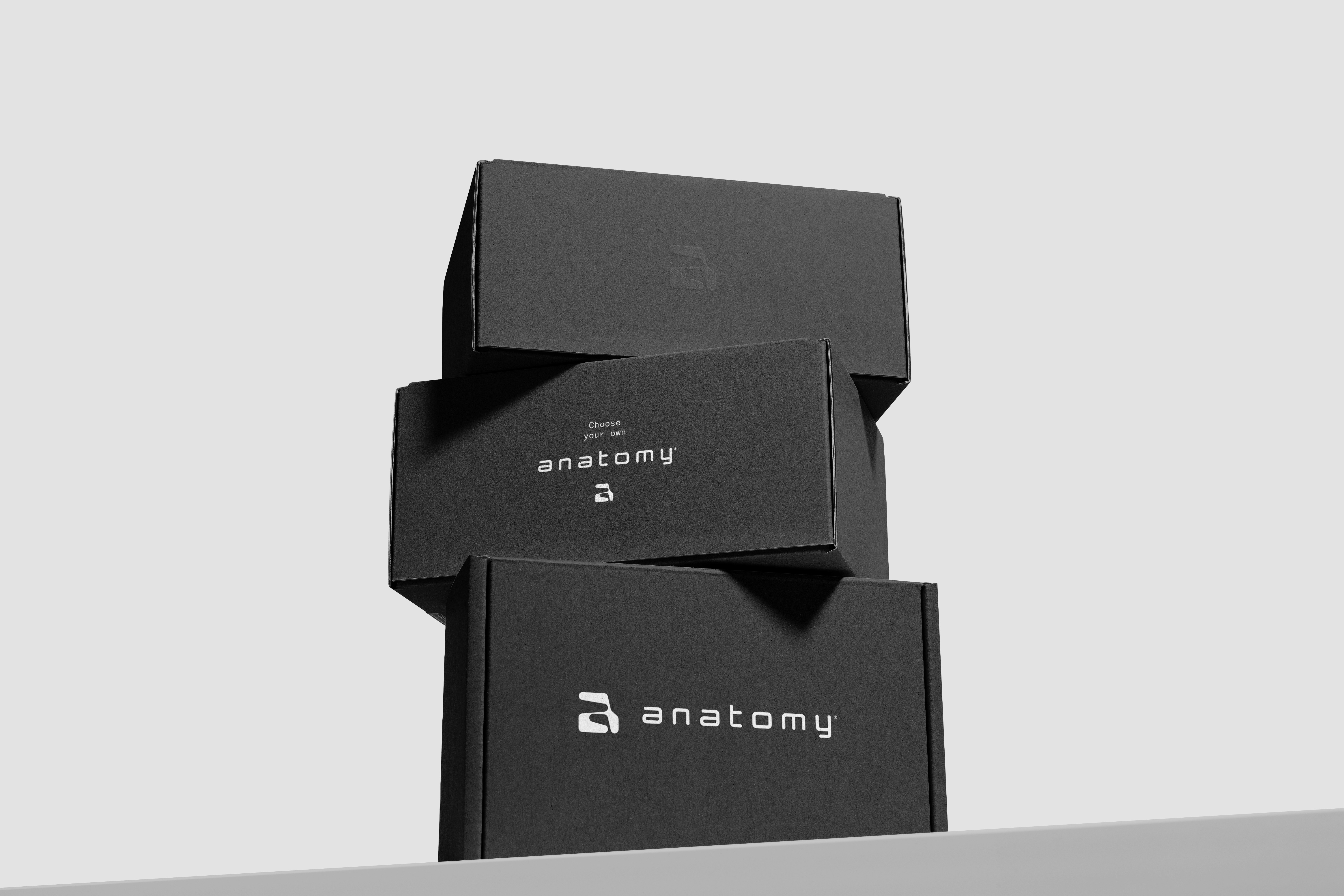 Streetside billboard with flyposters of the Batch.Works brand and illustrations