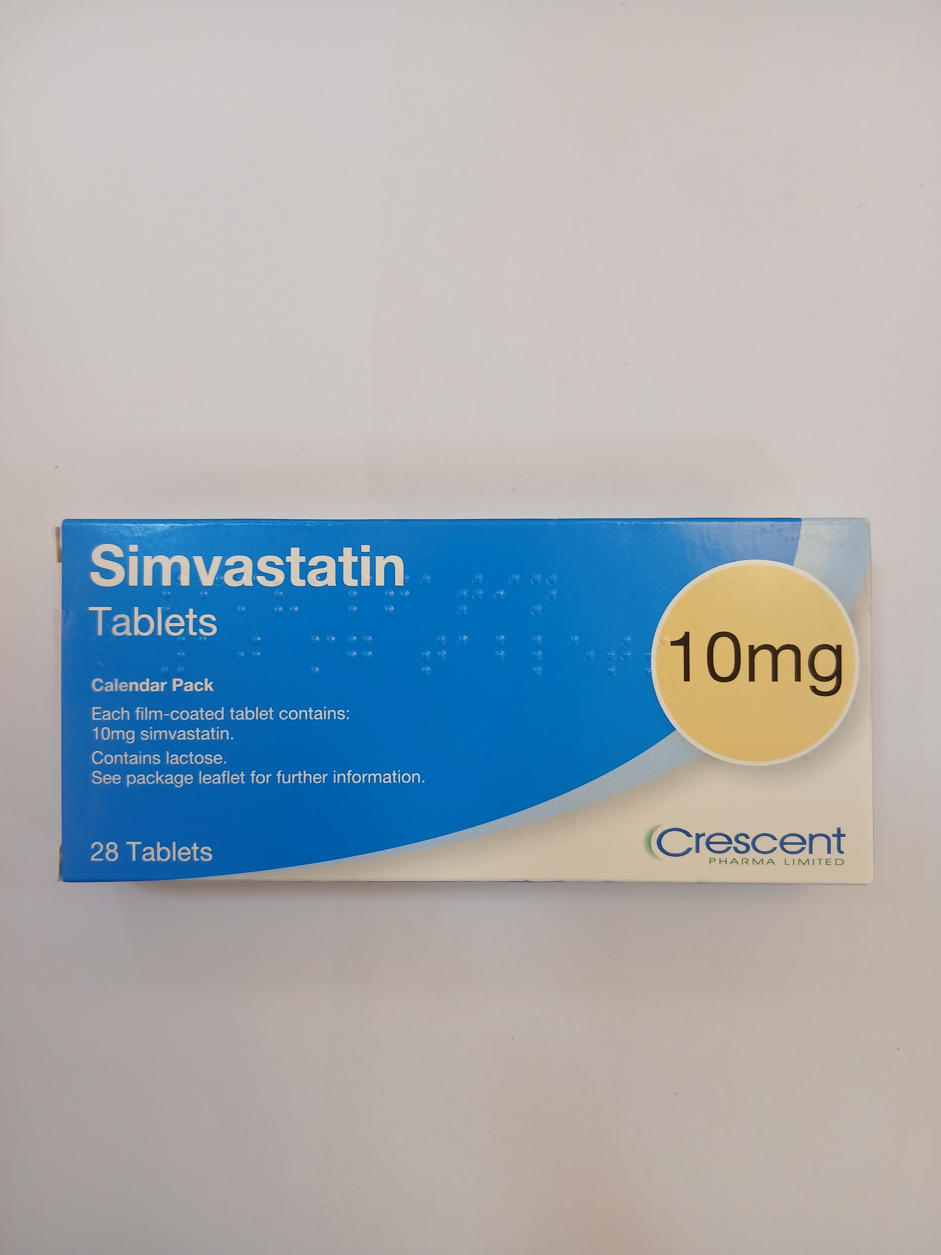 Simvastatin 10mg Tablets by Crescent, 28 tablets in a white cardboard blister pack.