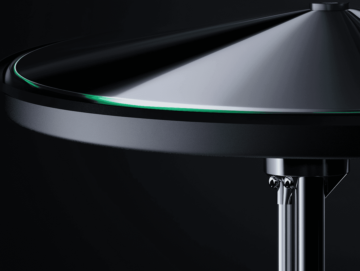 Minimalist metallic design with a conical top, green accent, and chrome base. Perfect for modern interiors or industrial aesthetics.