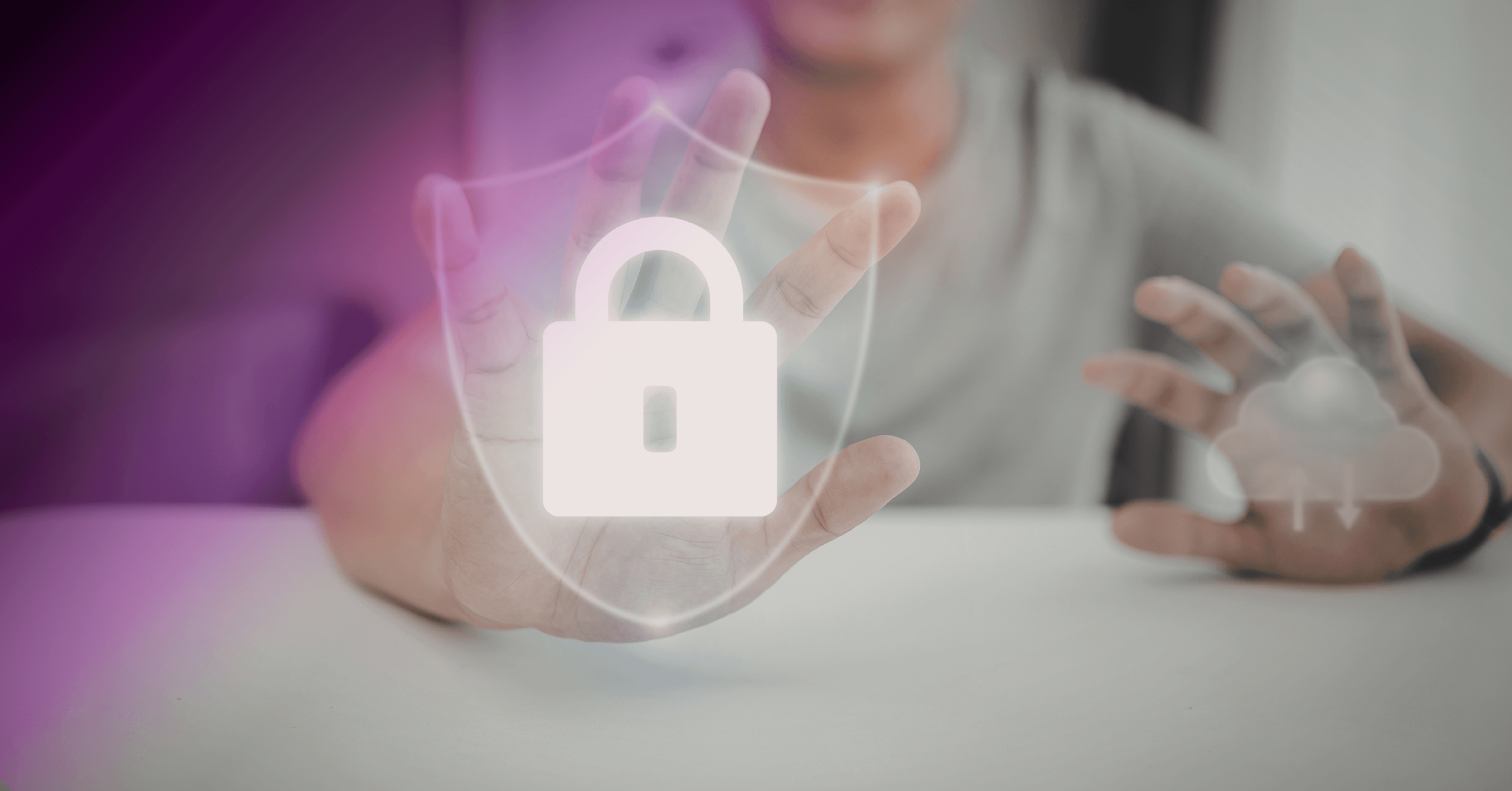  A person holding their hand up toward a glowing digital lock and shield icon.
