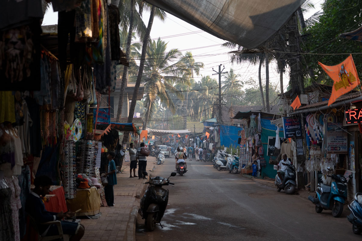 View of the main road with some shops in Arambol area of Goa, India