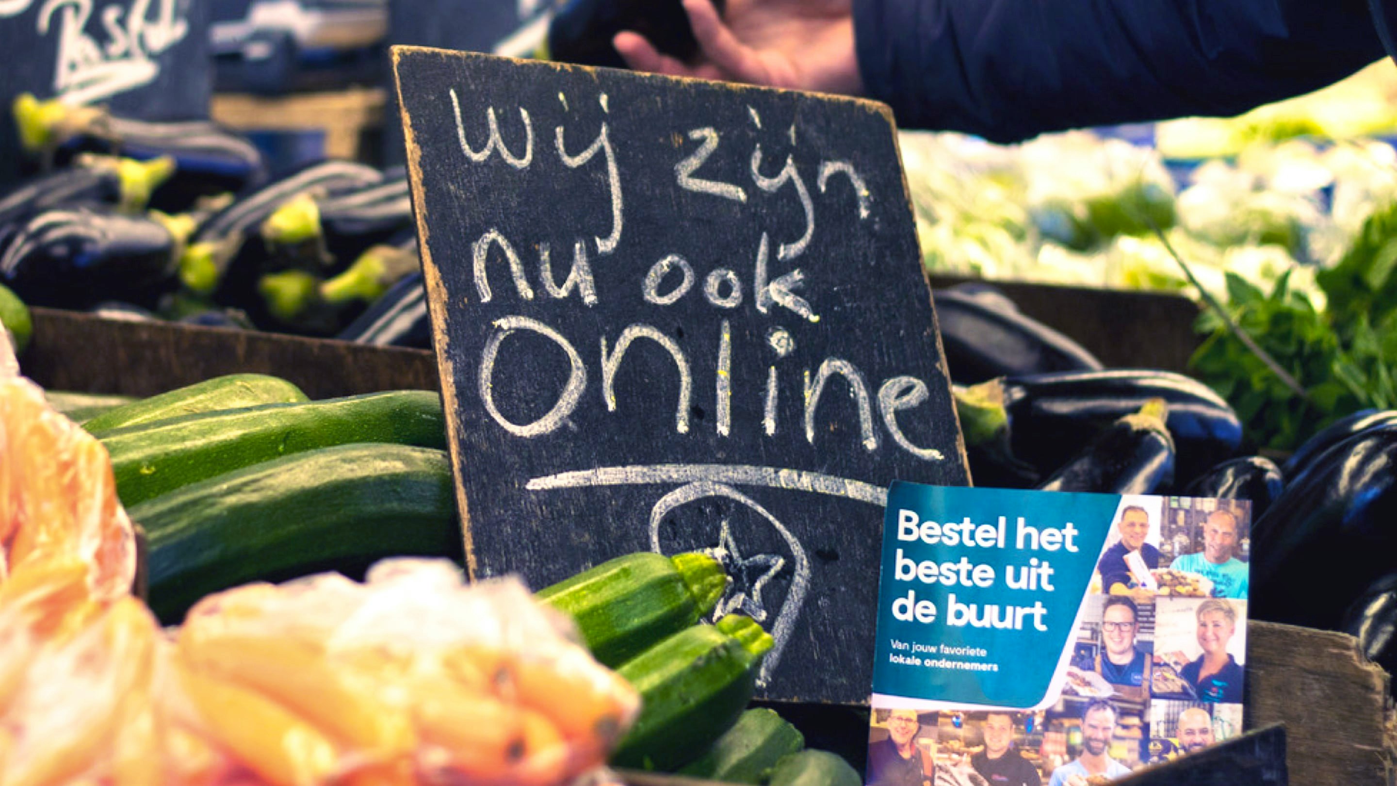 Local Heroes — image of a food court that shows a sign saying that Local Heroes is available online — Soda Studio case study