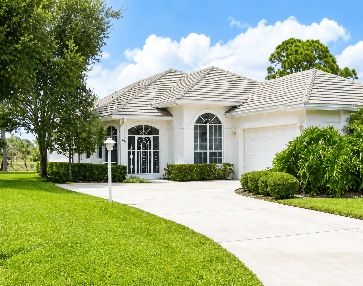 1996 New Roof Construction in Marsh Landing, PGA Village, Port St Lucie with Entegra Flat Broomswept Tile in Natural Gray