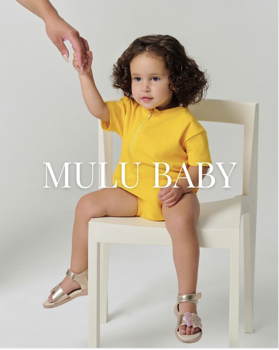 Friends laughing and posing inside a car