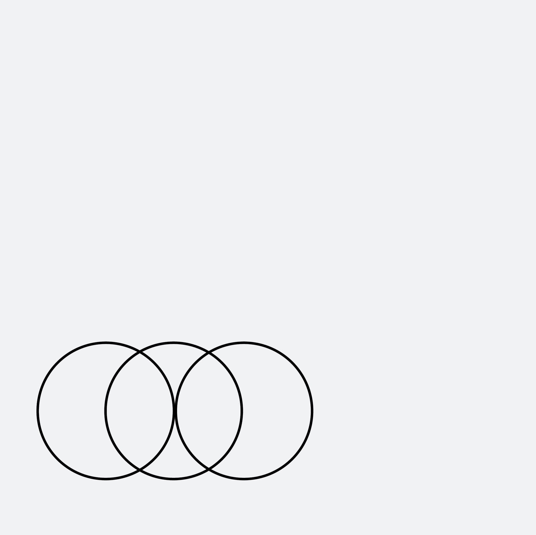 Minimal studio portrait of a confident woman in a white shirt, arms crossed, on a soft gray background.