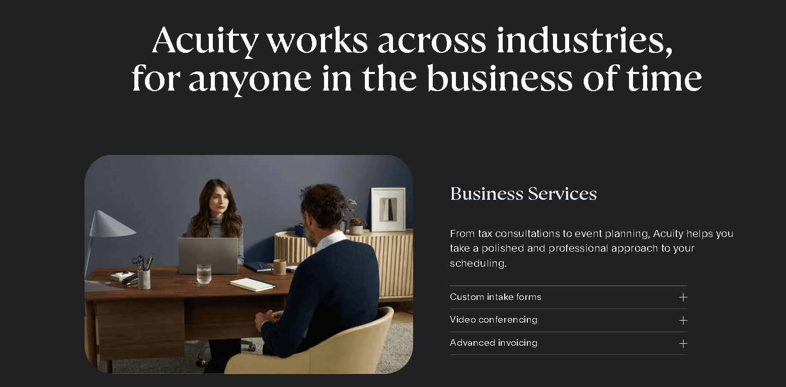 A professional consultant meeting with a client at a desk, illustrating how Acuity Scheduling works across industries with features like custom intake forms and advanced invoicing.