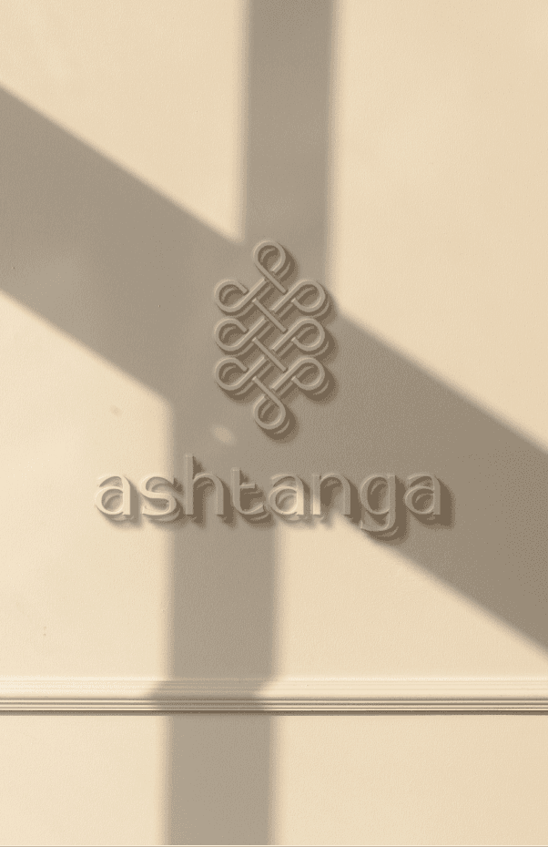 Palm trees frame a dramatic mountain valley landscape