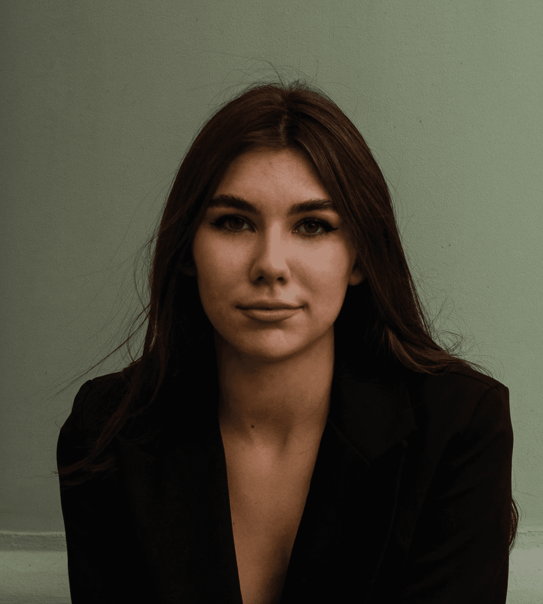 a woman sitting on a couch