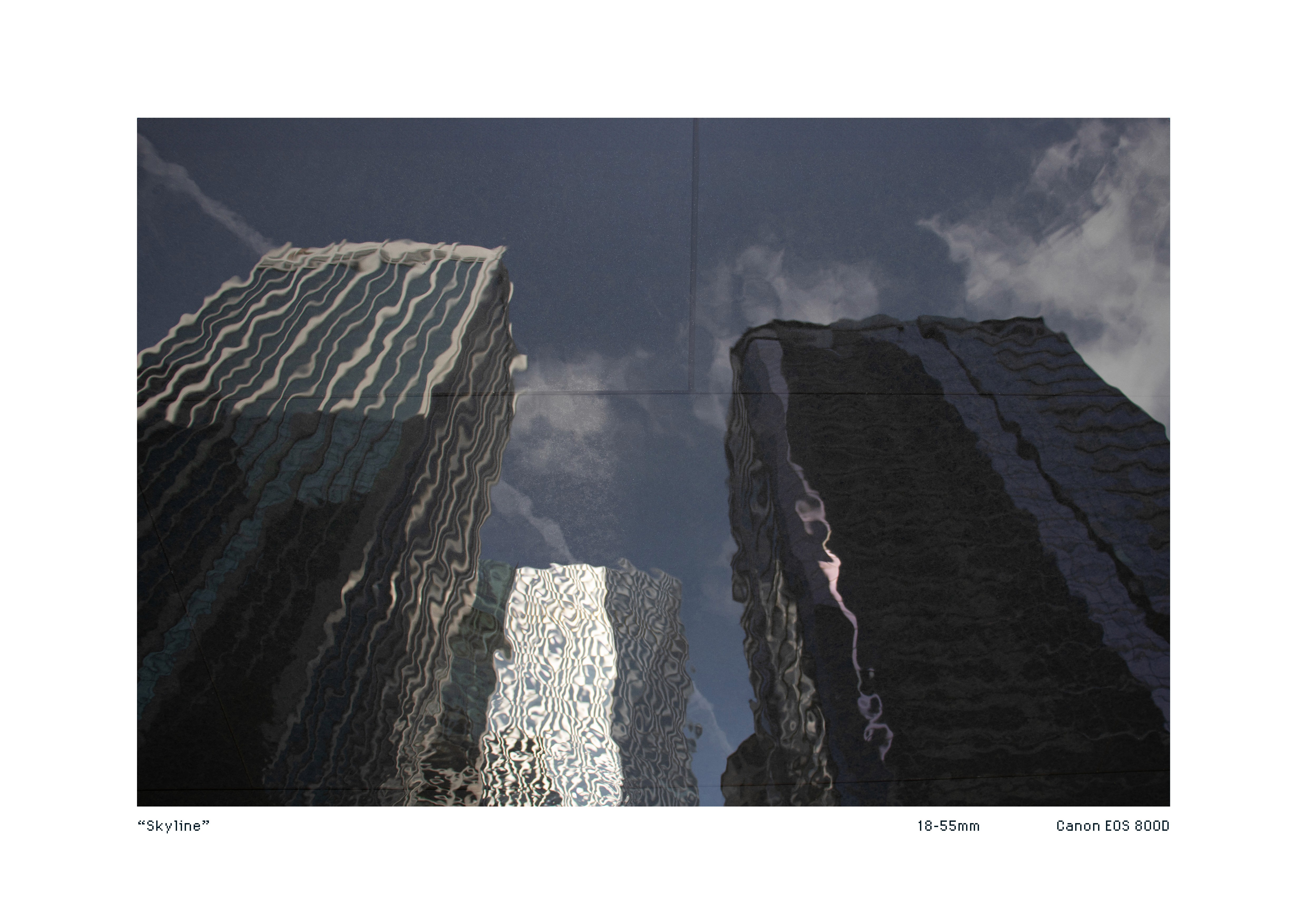 Shot of buildings in the reflection of water
