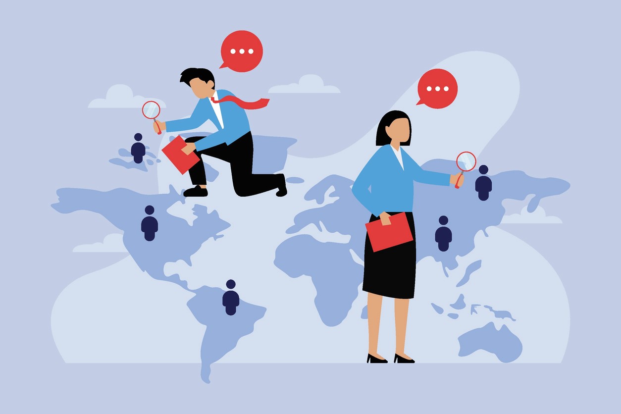Illustration of business professionals searching across a global map with magnifying glasses.