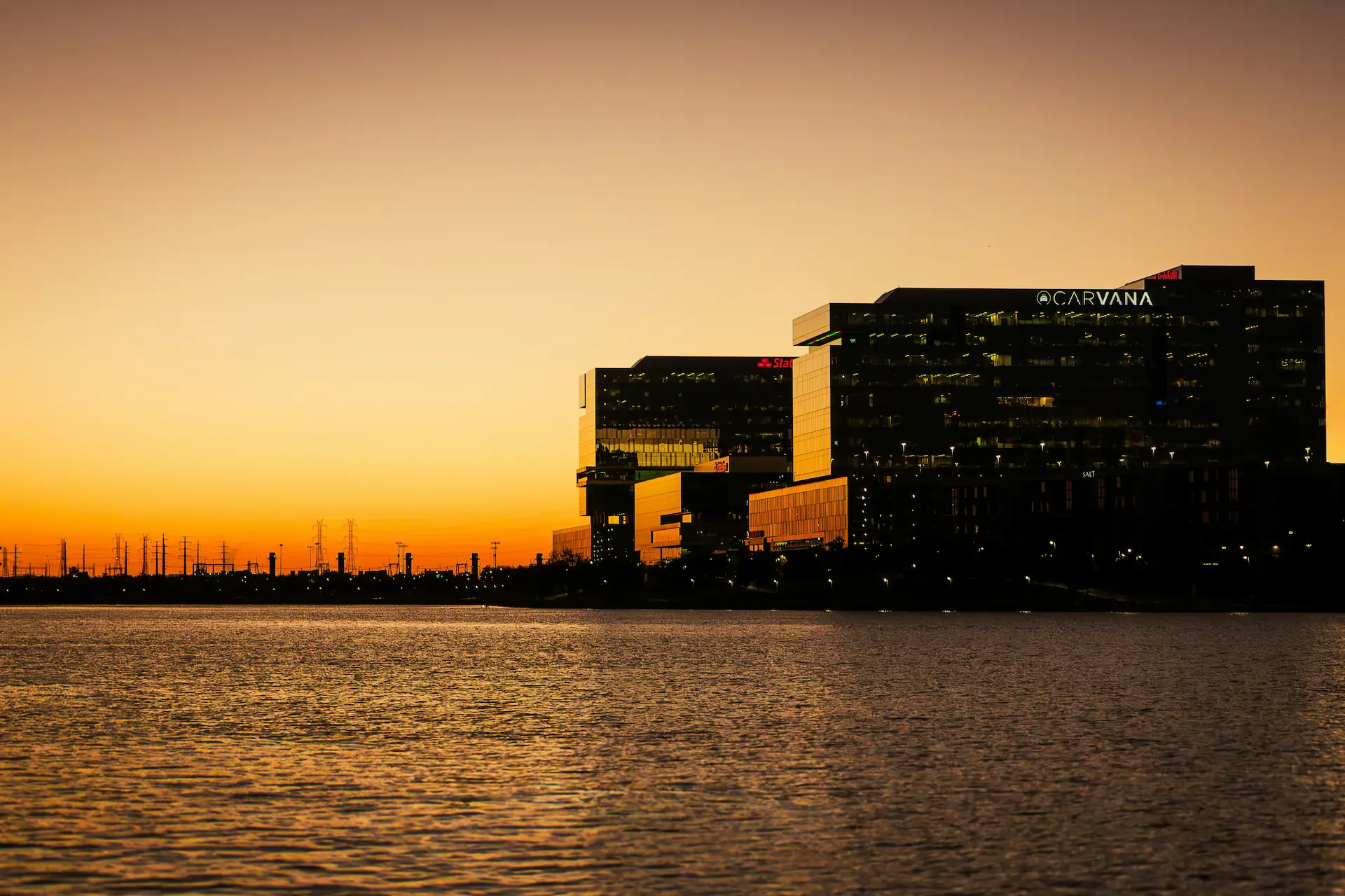 Sunset view of the Tempe Town Lake corporate skyline representing professional commercial cleaning services for large office complexes.