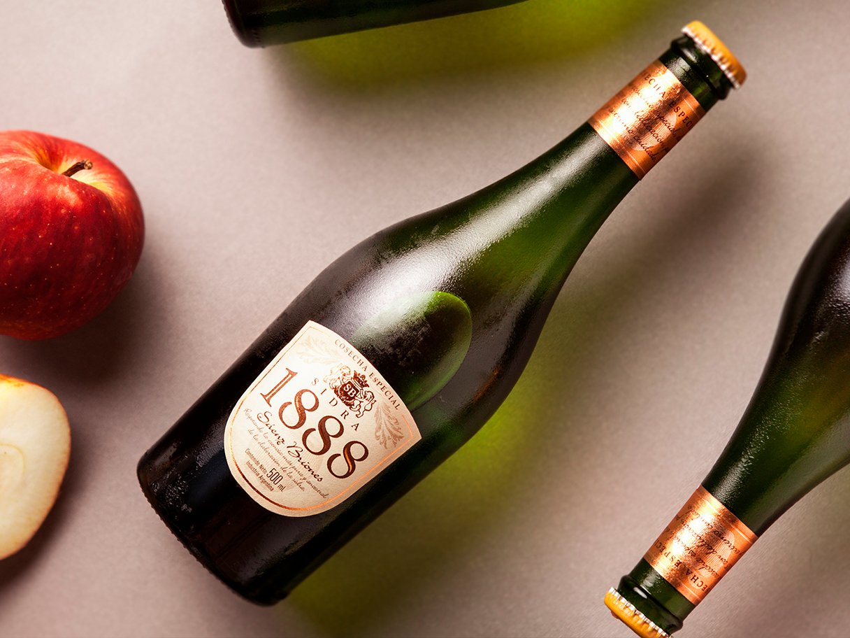 Rustic cabin in a golden field at sunset