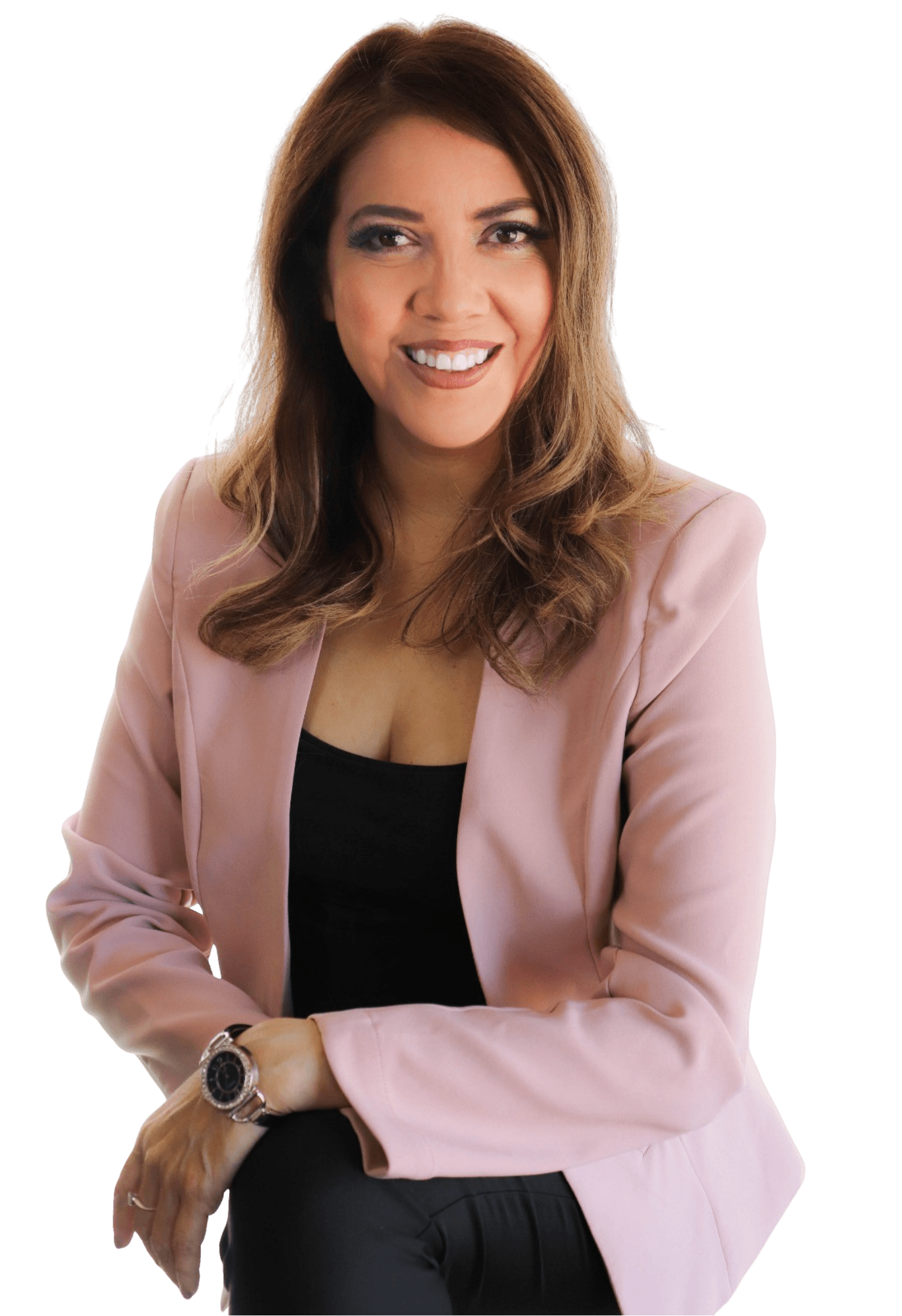 A woman sits cross-legged with eyes closed, wearing a white blouse and a long purple skirt, looking serene.