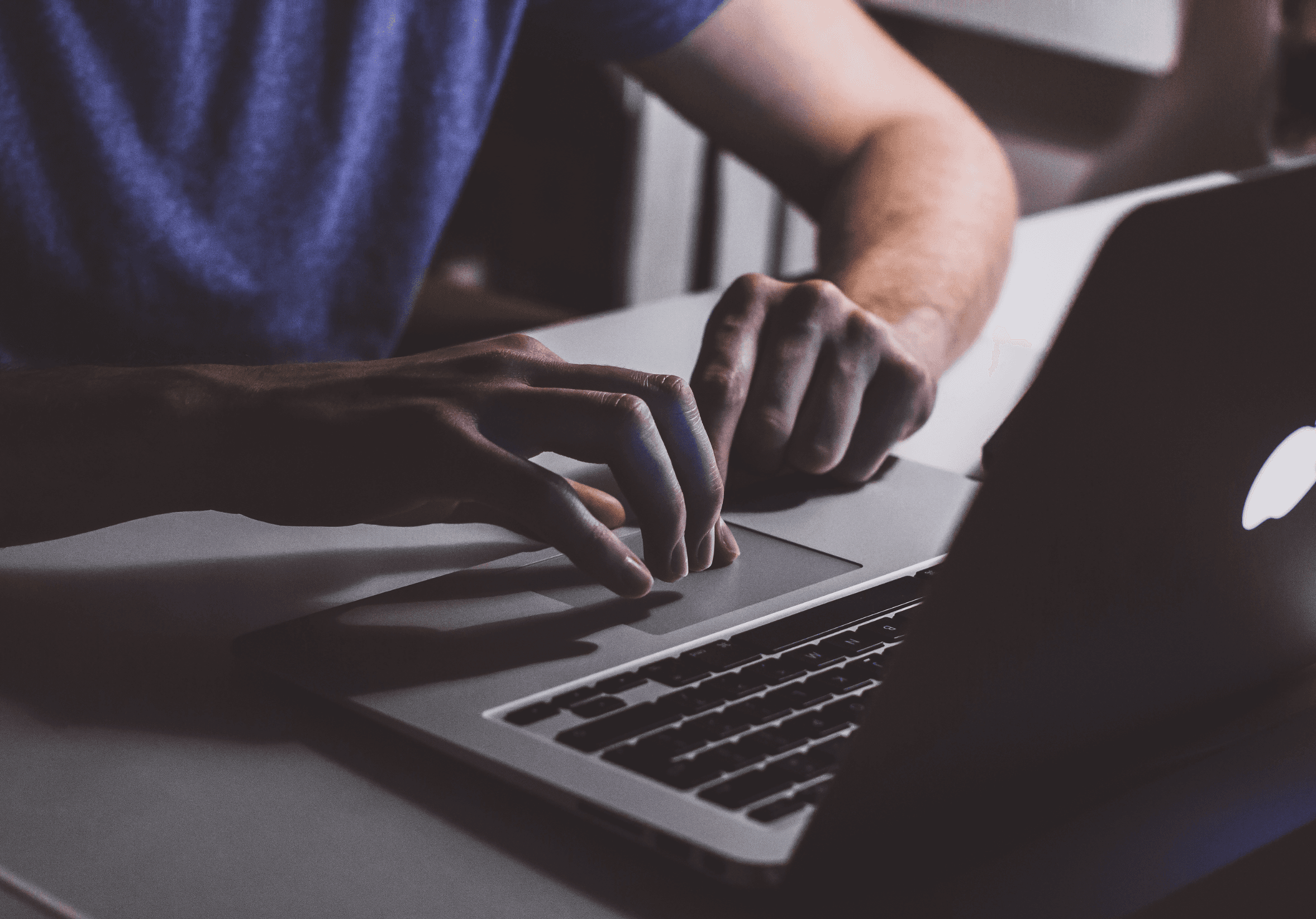 people sitting on chair in front of laptop computers