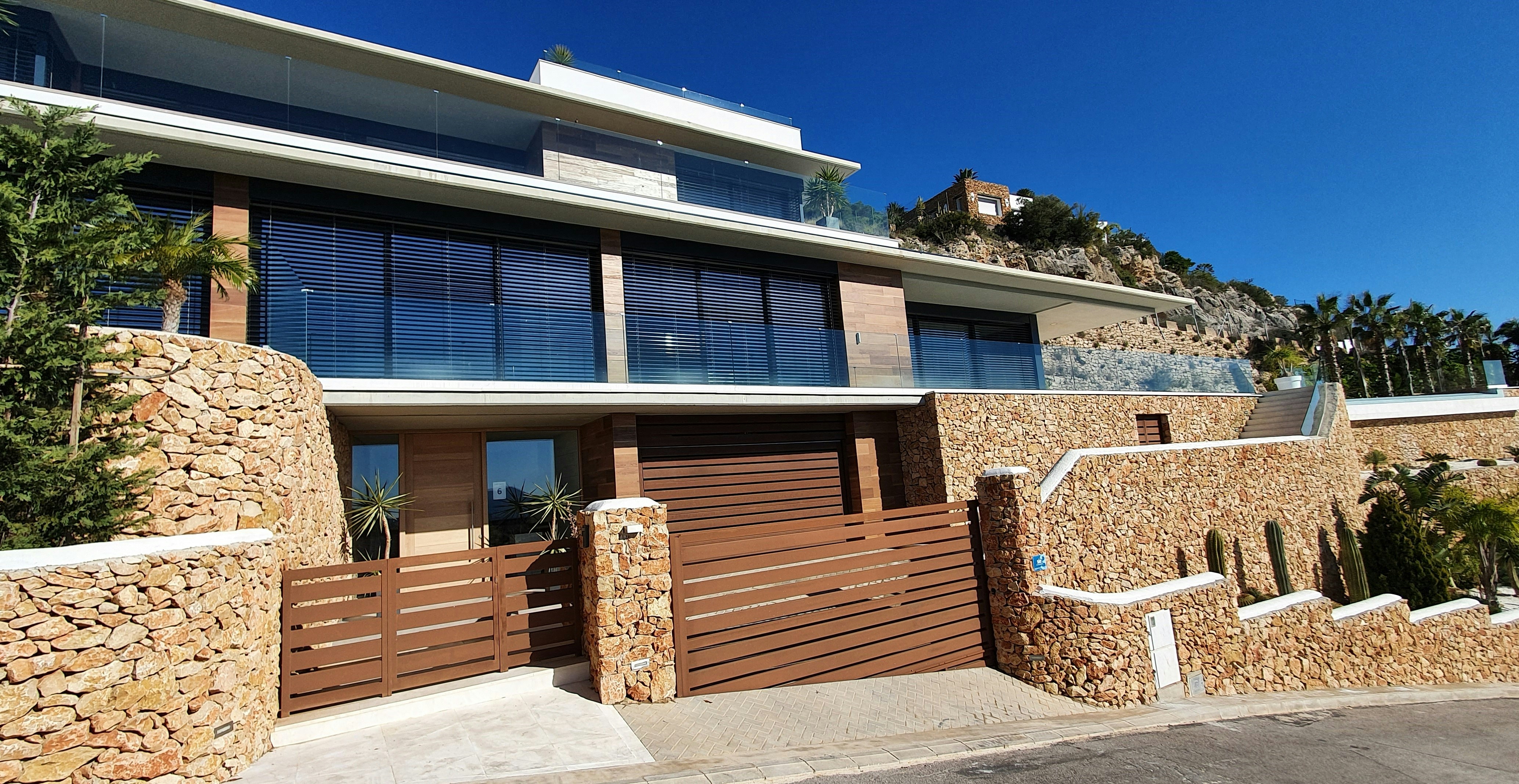 brown wooden chairs on white concrete floor