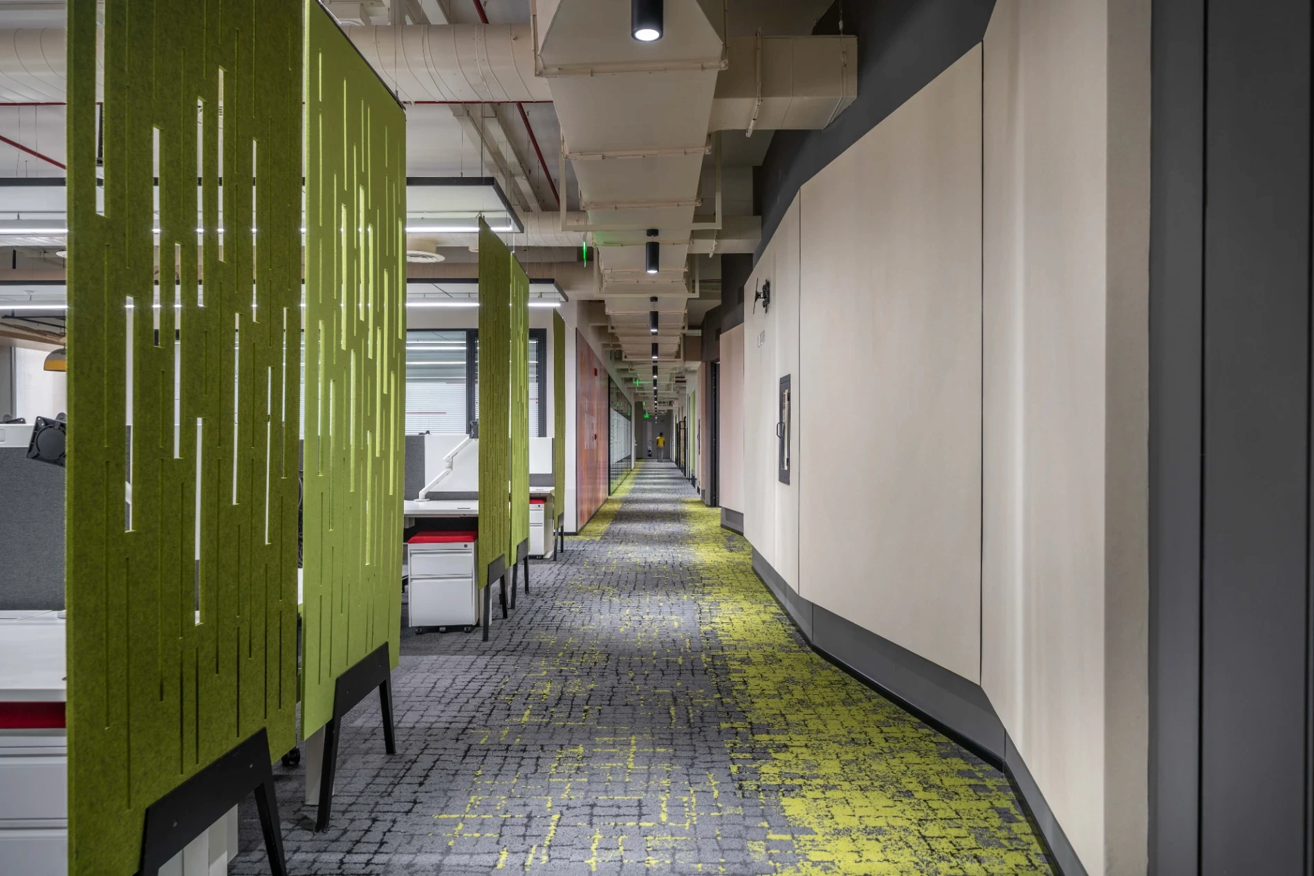 Passage way designed for workspace with pet panels designed as partitions 