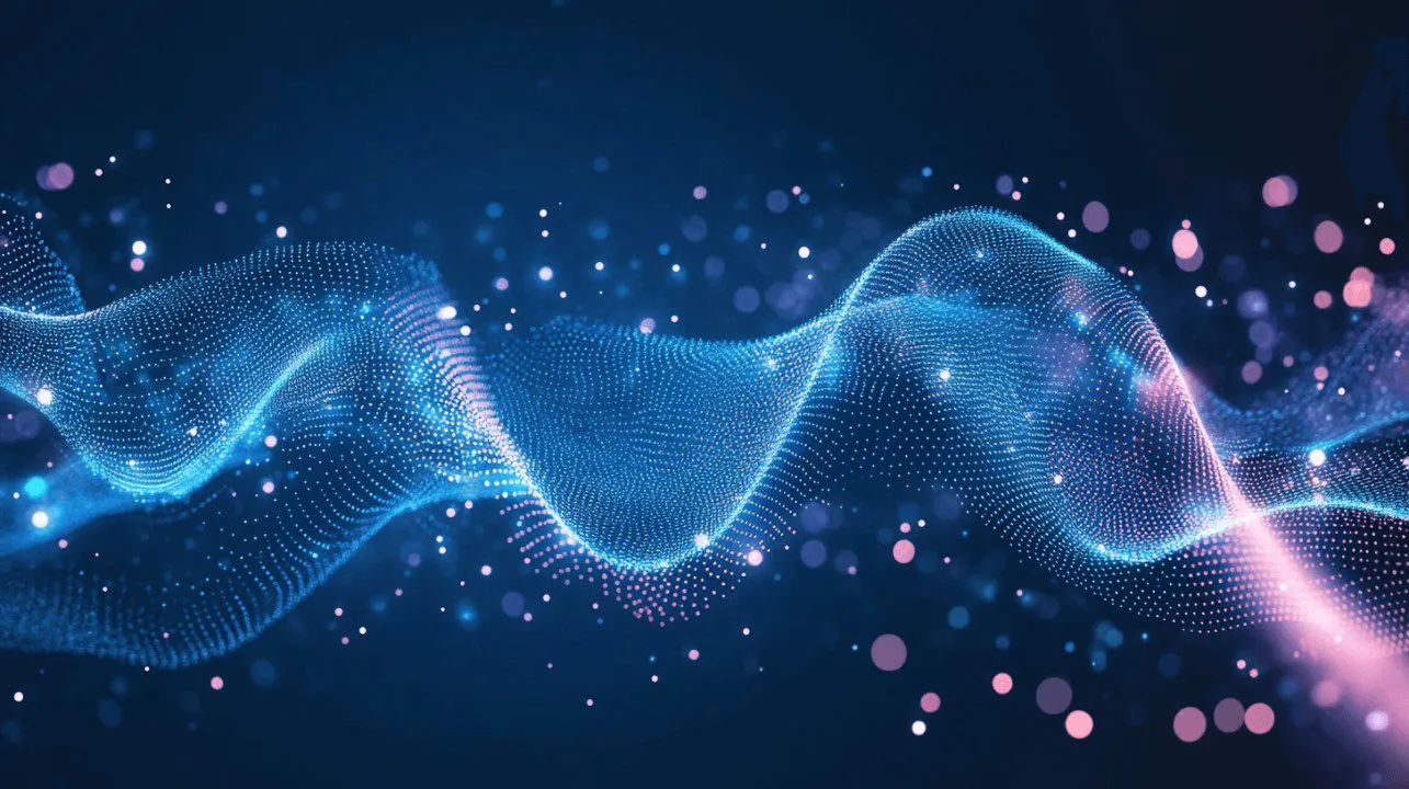 A winding road cuts through rocky terrain, surrounded by patches of green grass and illuminated by sunlight.