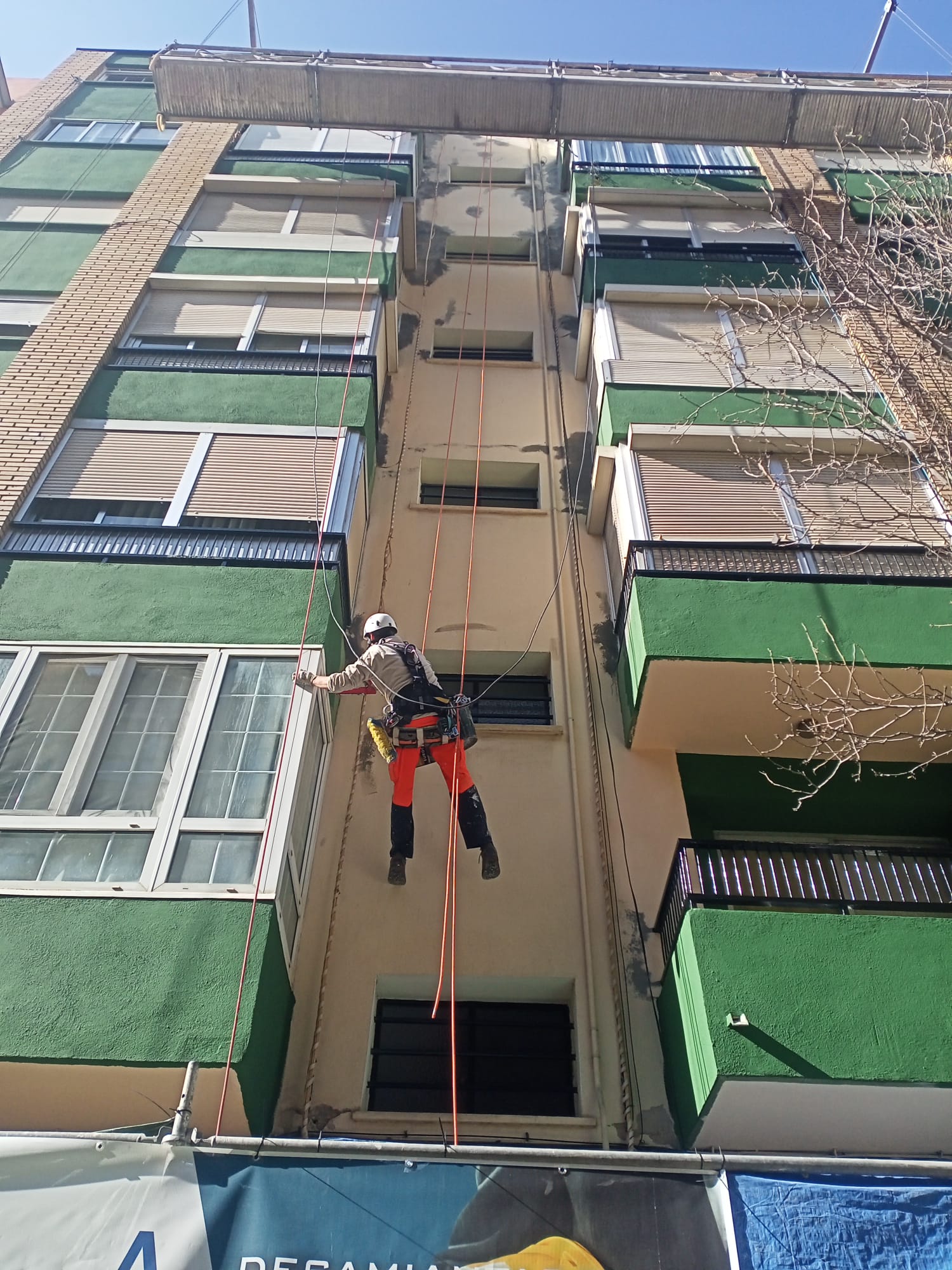 modern living room and kitchen with wooden cabinets and soft natural light