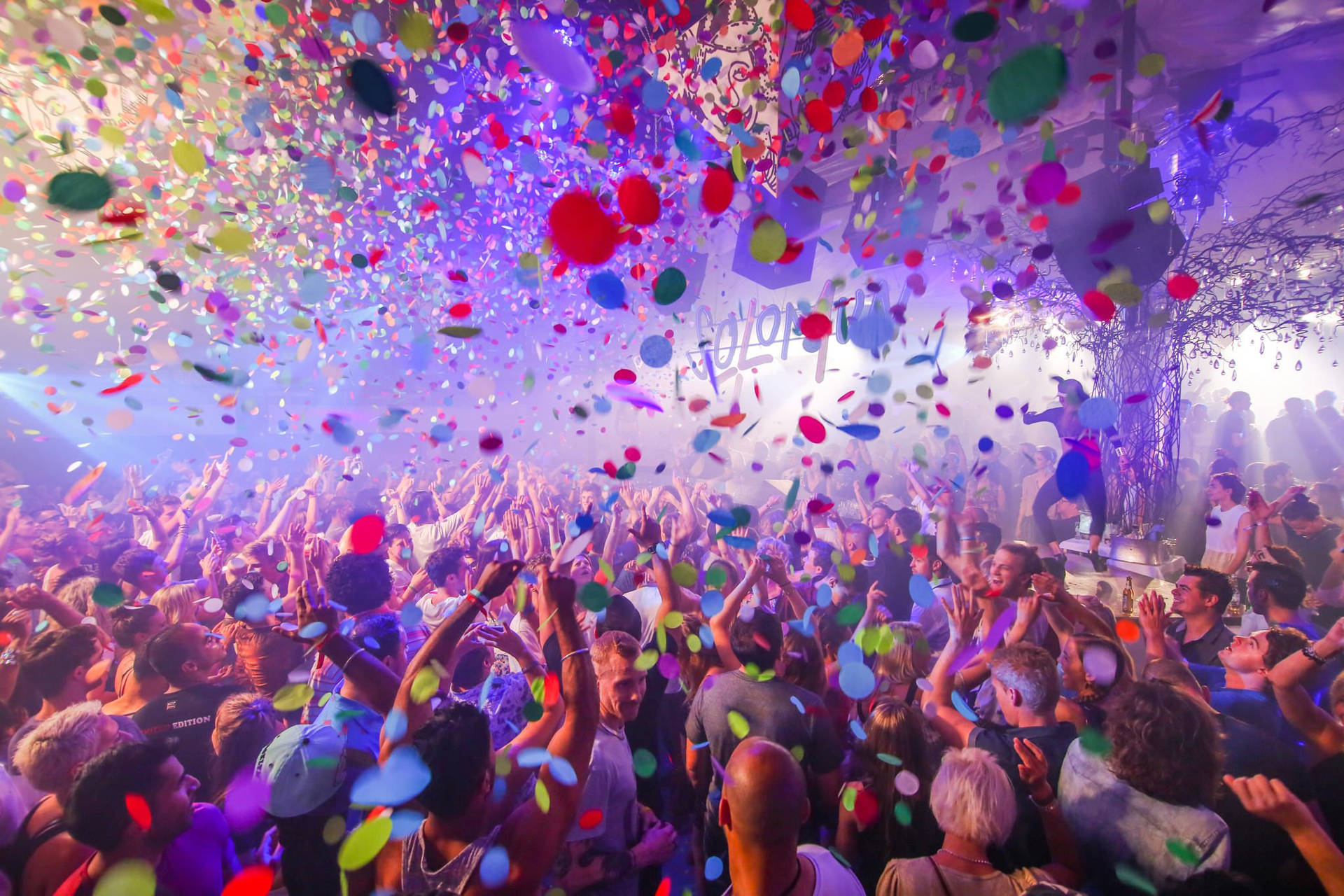 the eiffel tower is lit up at night