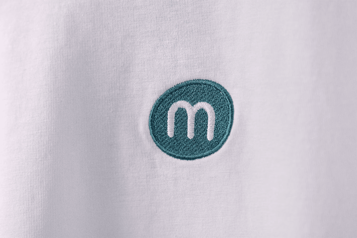embroidered logo on white t-shirt