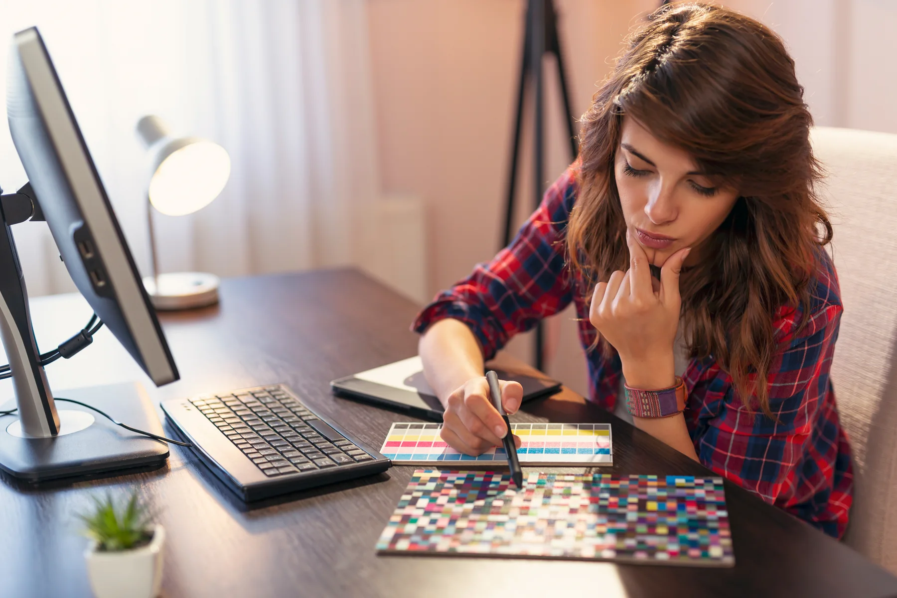Woman working in a creative design workplace