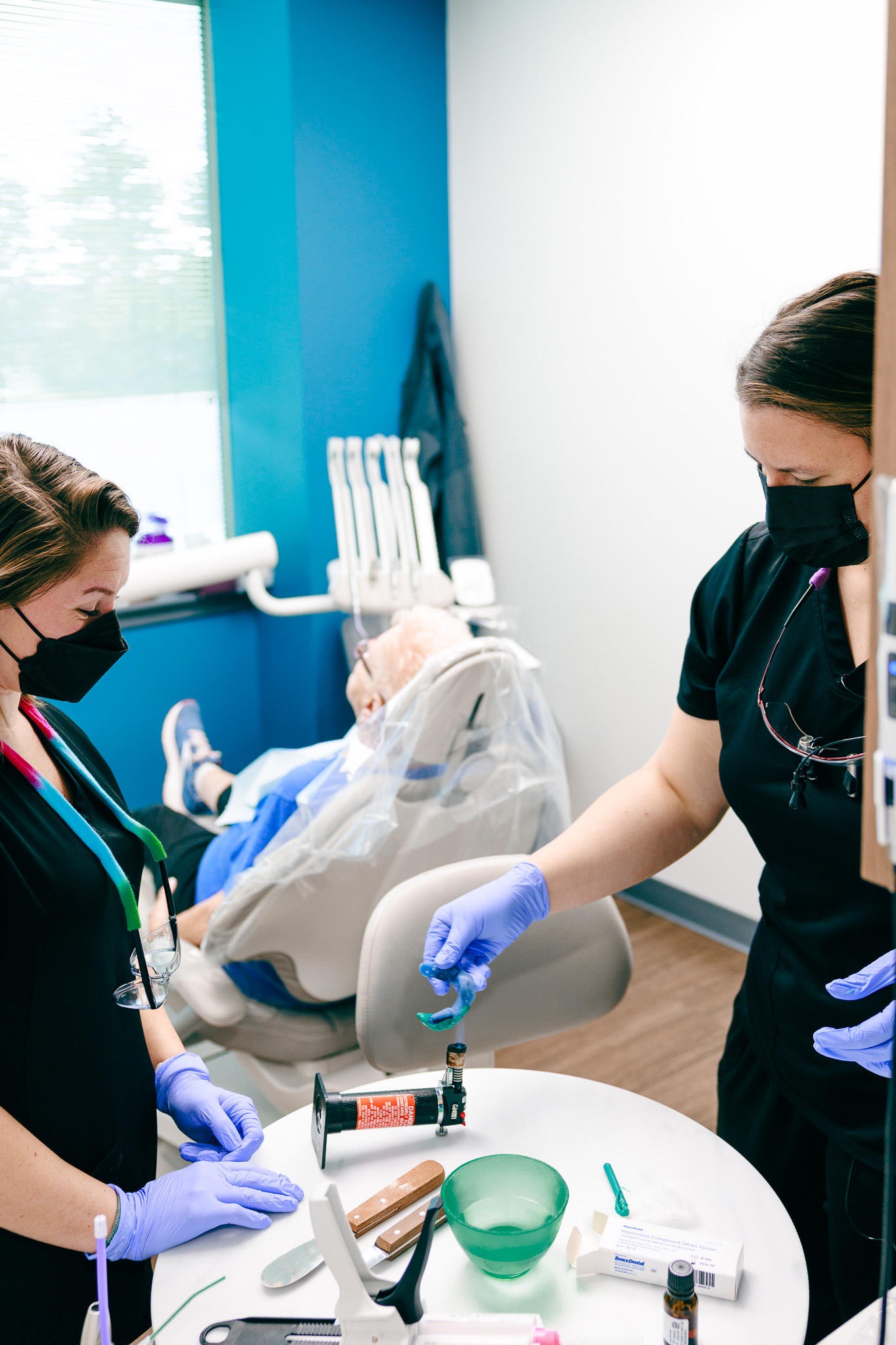 Soothing dental clinic with a compassionate dentist and a patient in a treatment chair