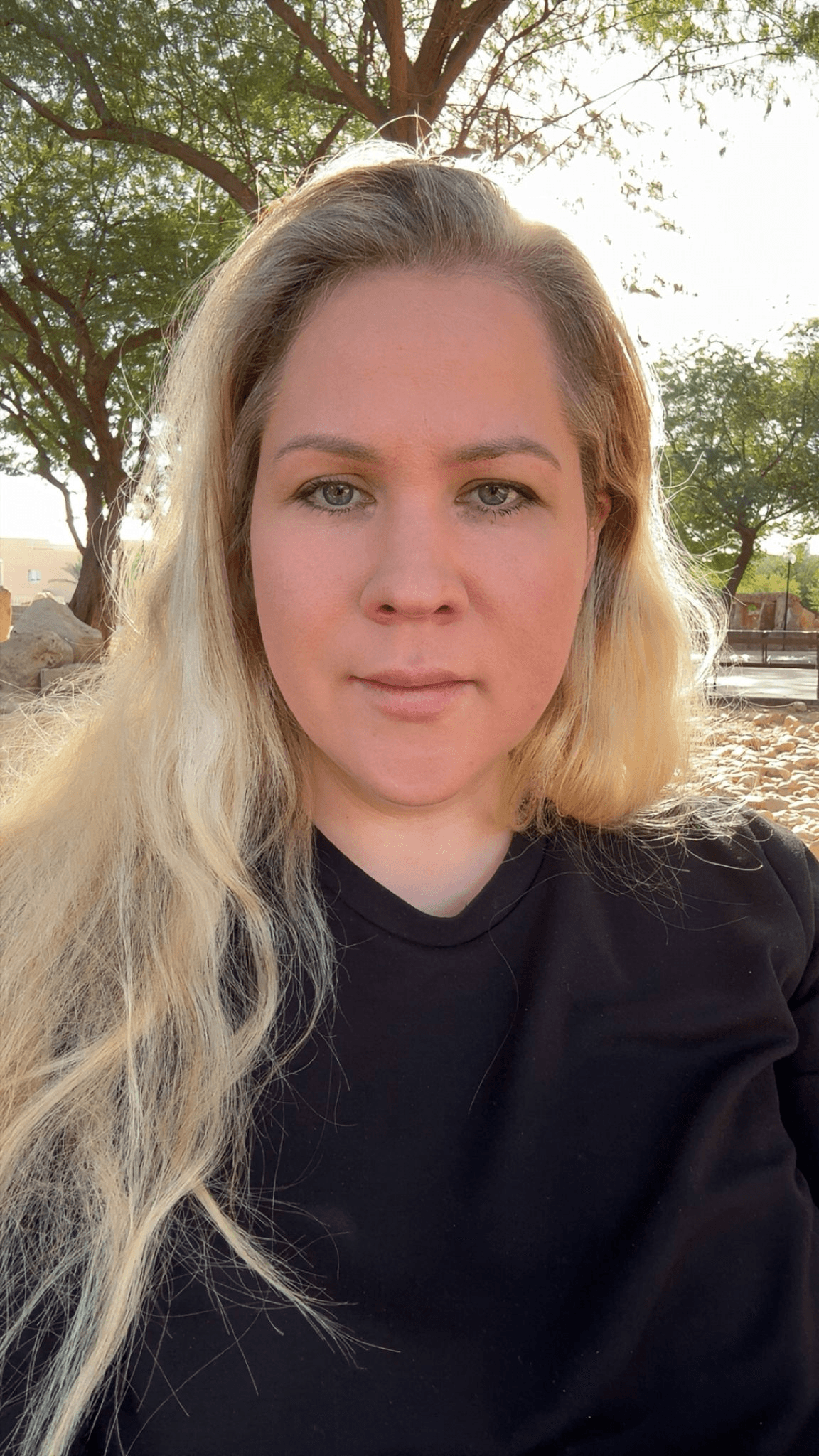 man wearing black crew-neck shirt