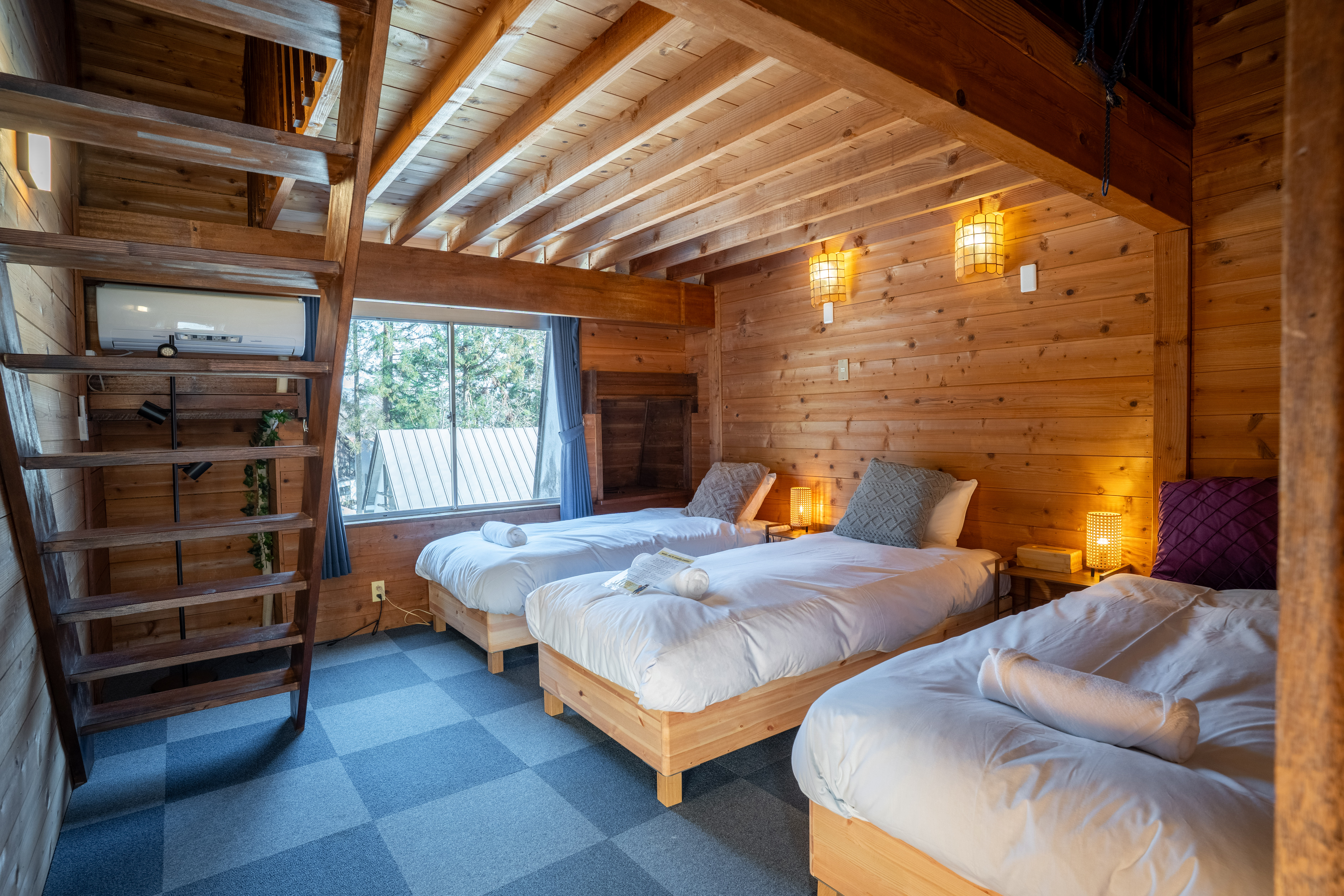 Quad room interior at Sneaky Peaks, Hakuba