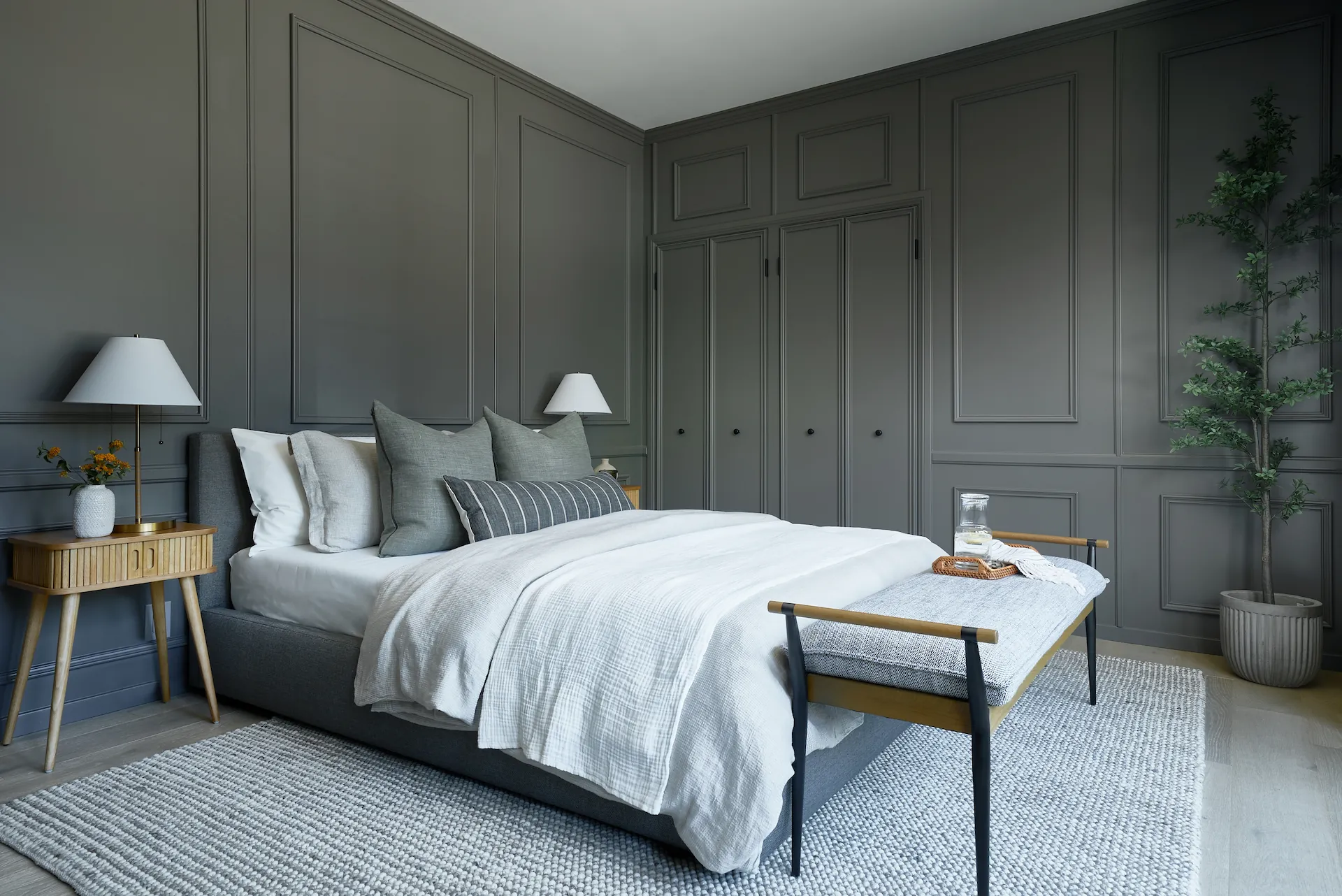 Wide view of the primary bedroom showcasing overall design and layout. Photo by Todd Huge.