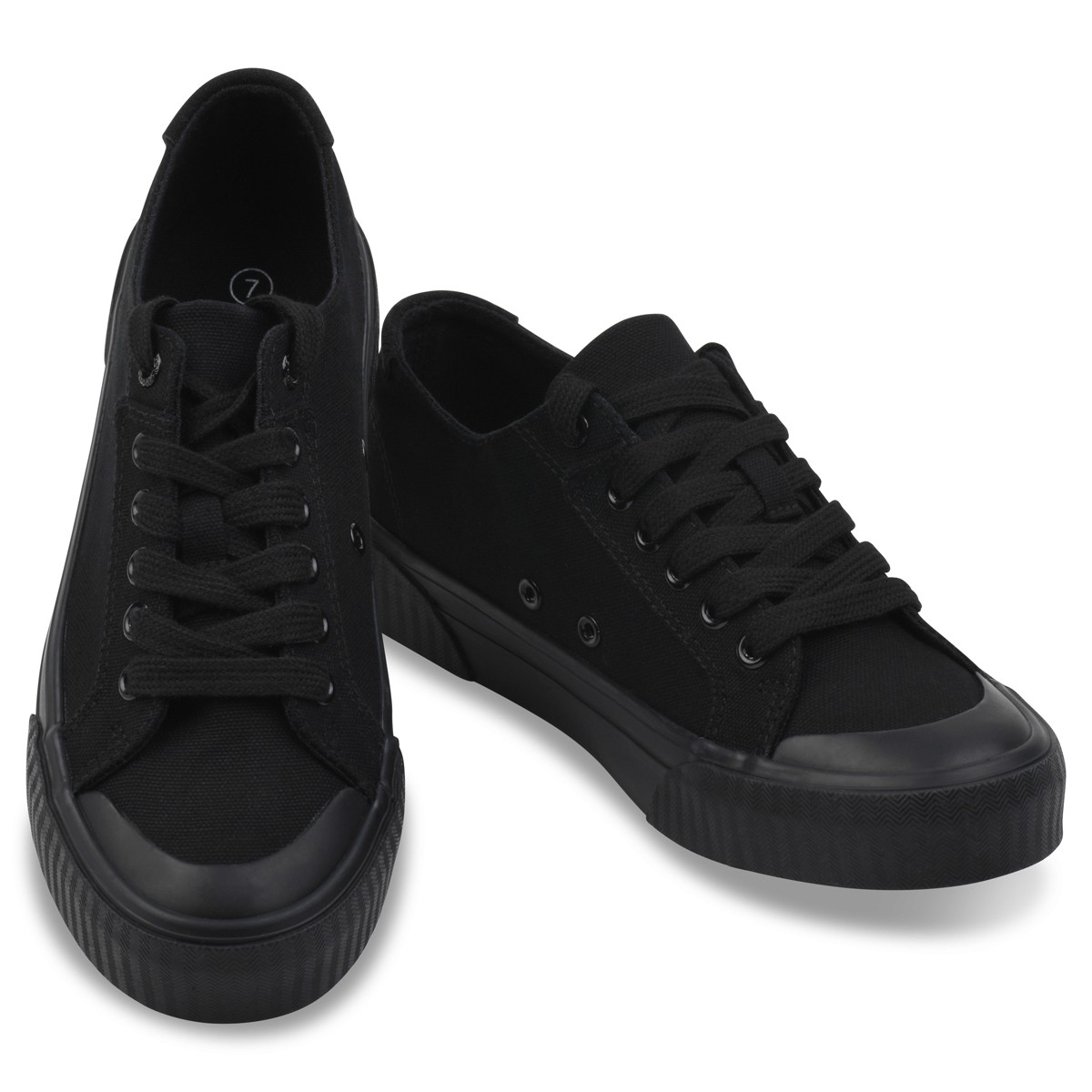 Pair of black low-top sneakers on a white background. Main Amazon listing image example for an ecommerce portfolio.