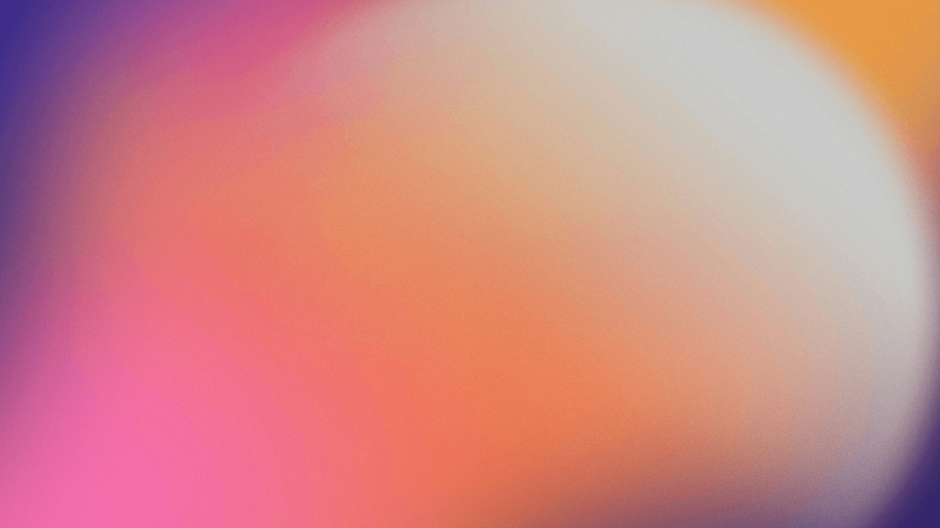 a blurry image of a red, yellow and blue background