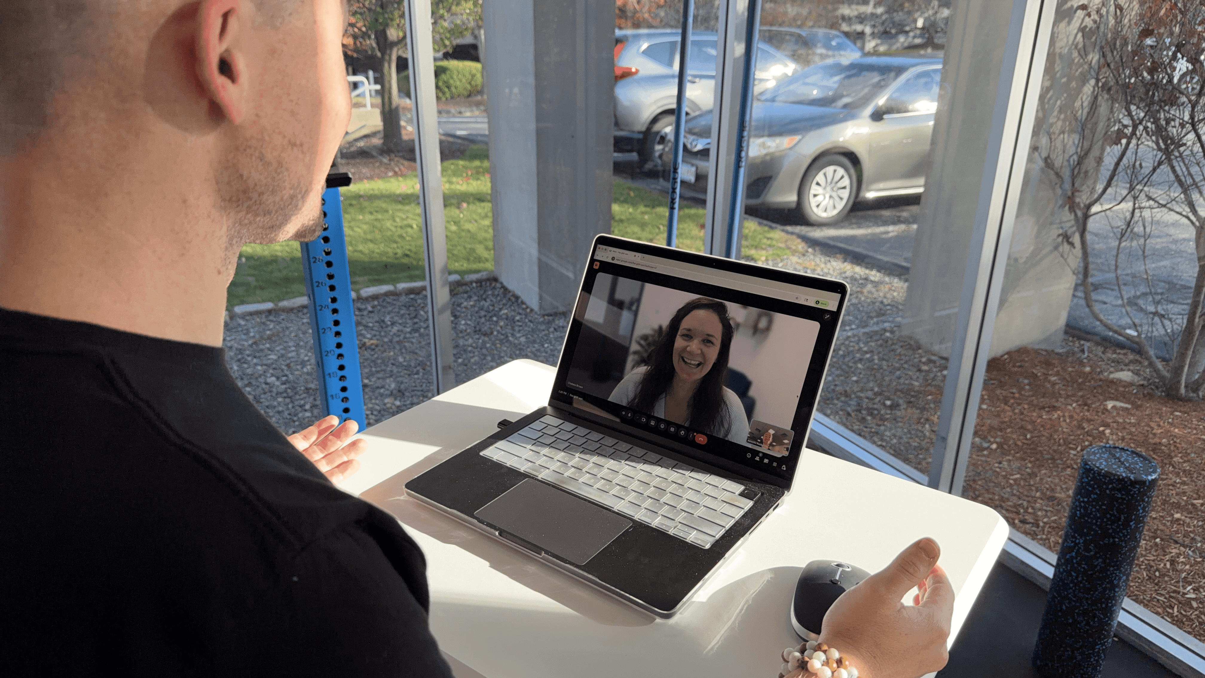 photo of an athlete and coach having a virtual meeting