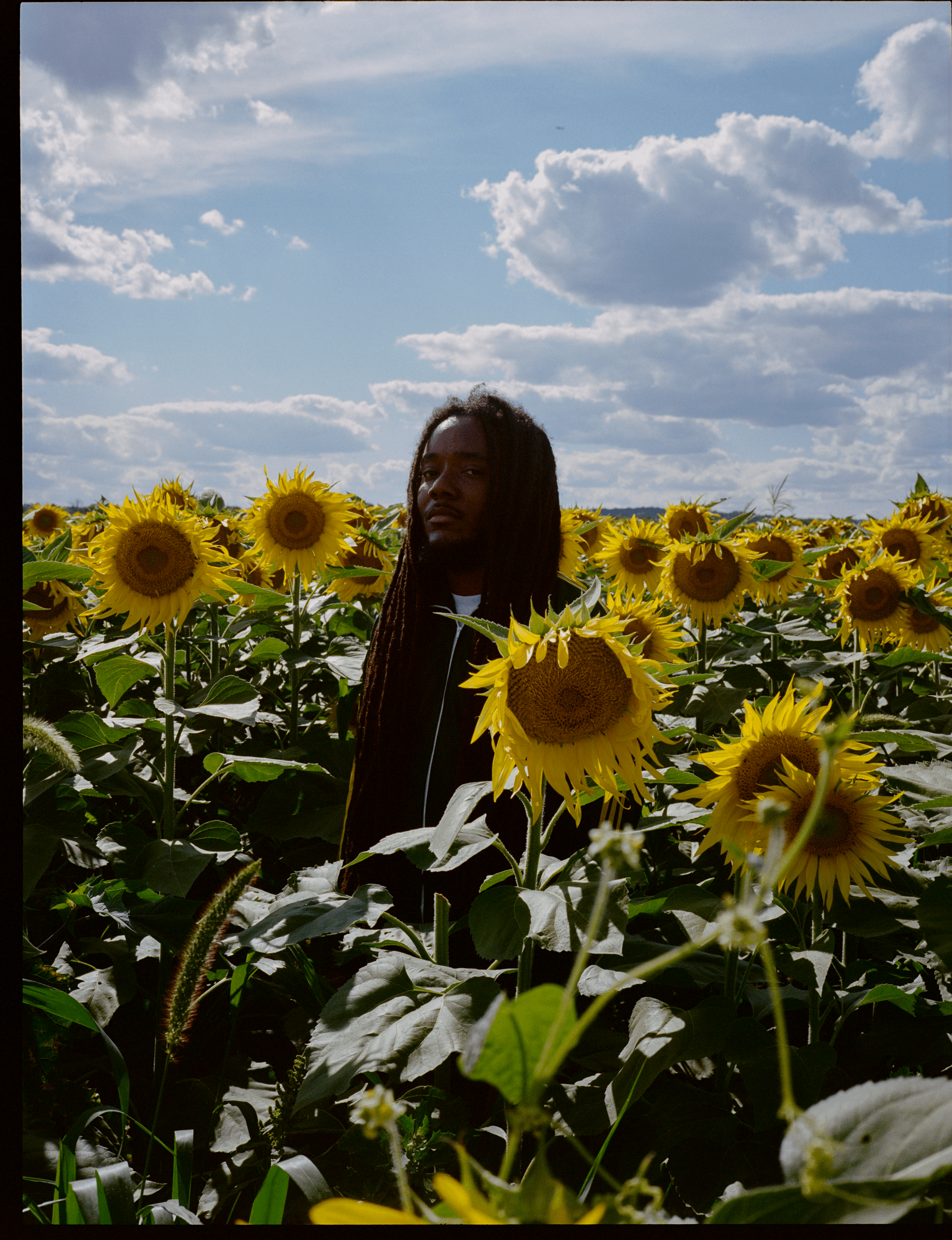 Surreal portrait of man with kaleidoscope effect and neon lighting