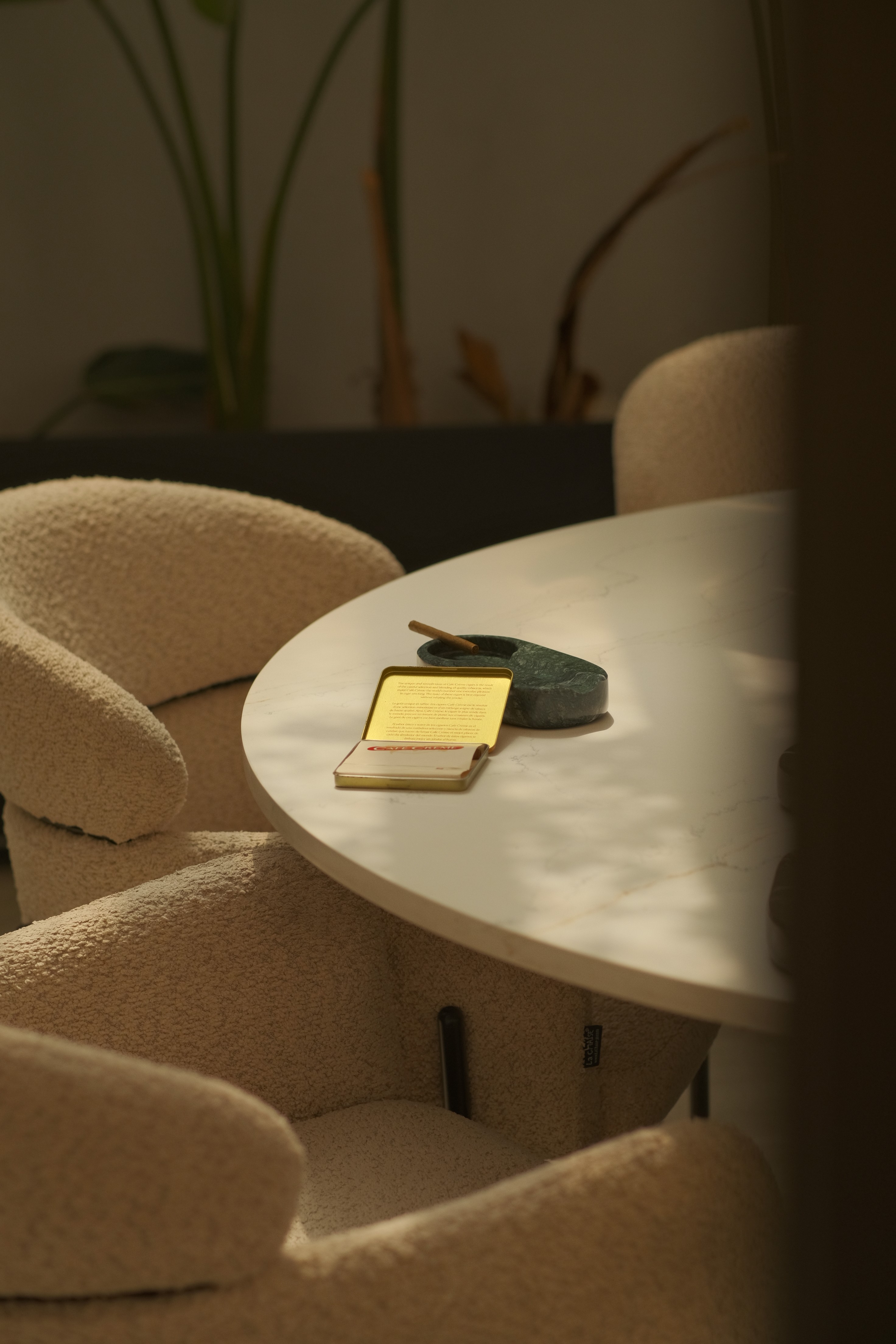 A scene of two soy wax candles on a table