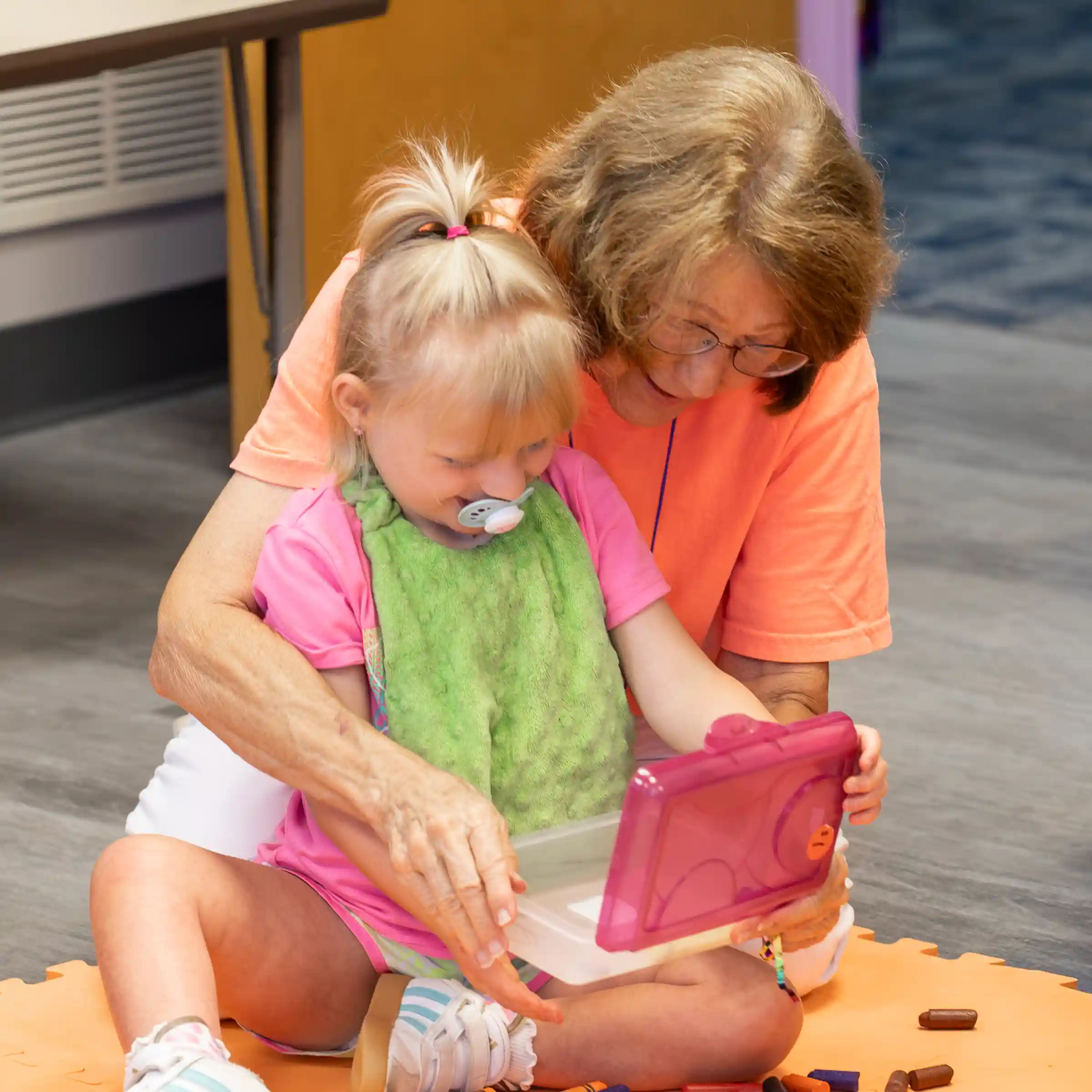 WAVES Toddler Drawing with Volunteer