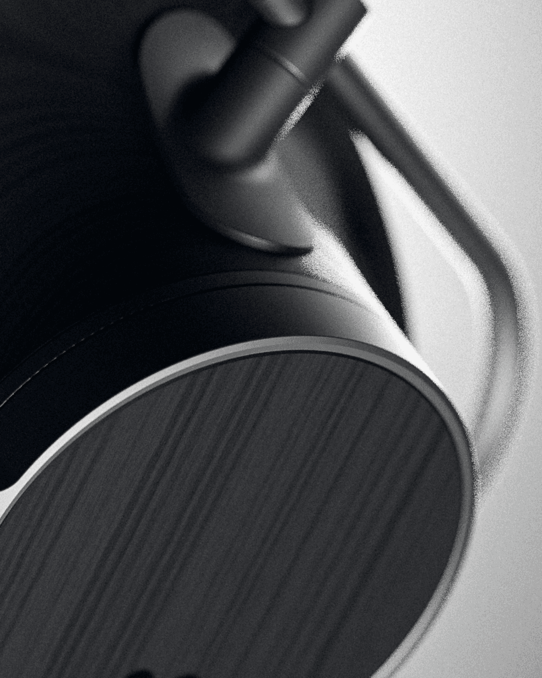 Black and white computer rendering of over the ear headphone detail.