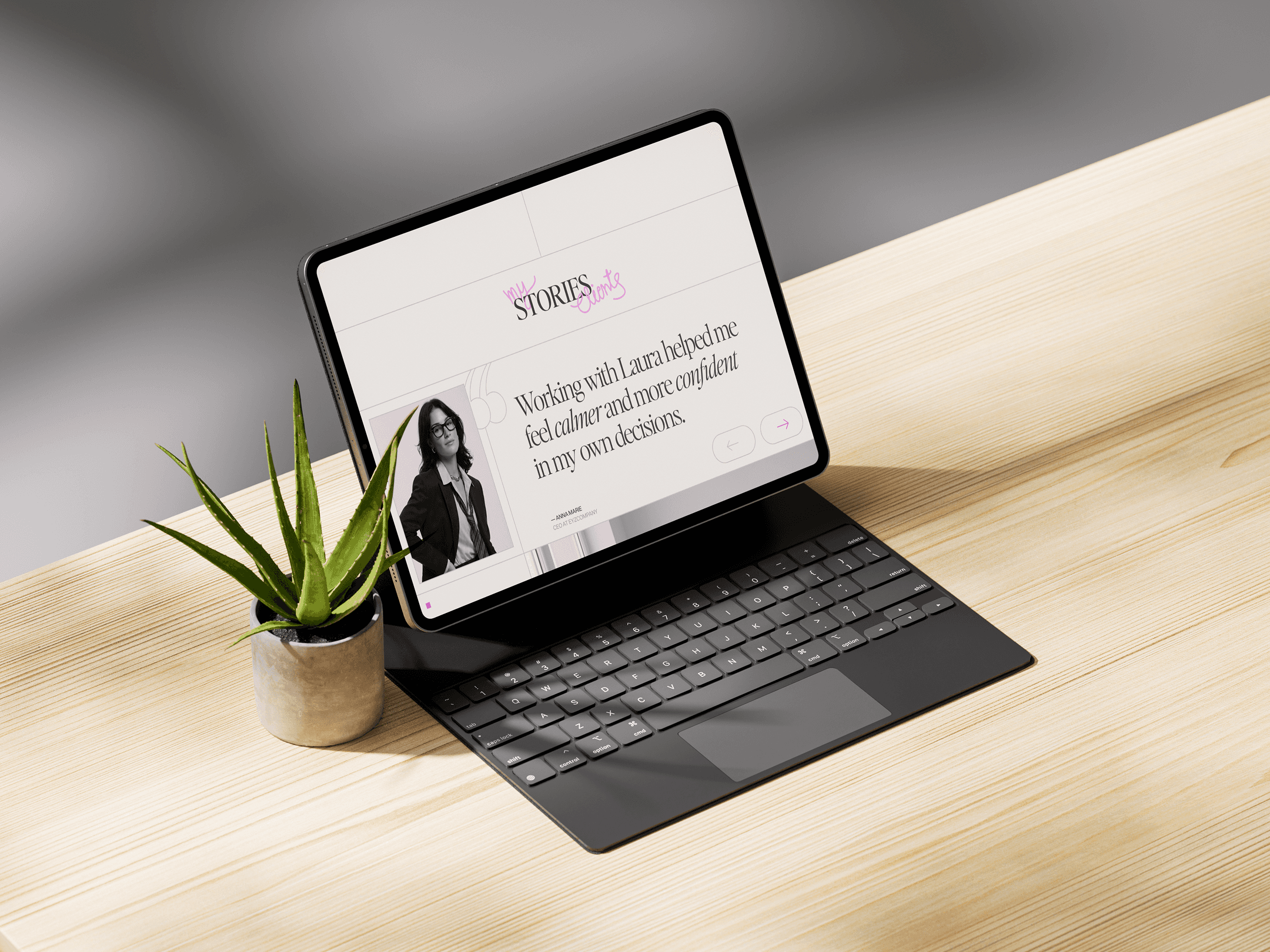Tablet showing a website with a woman's testimonial on a wooden desk.