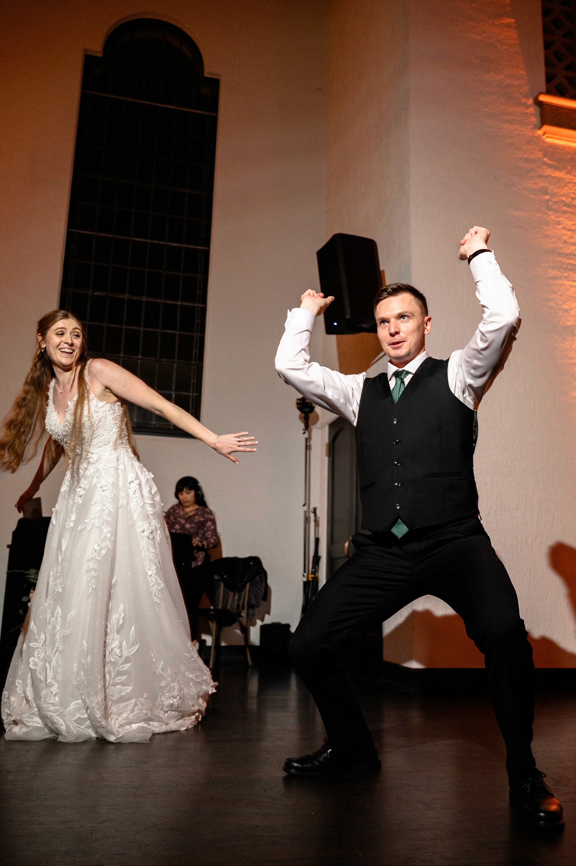 Flat lay wedding details with bouquet, rings, and sparkling bridal heels