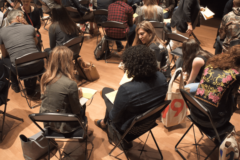 A flat-team working environment showing open, distributed collaboration in practice.