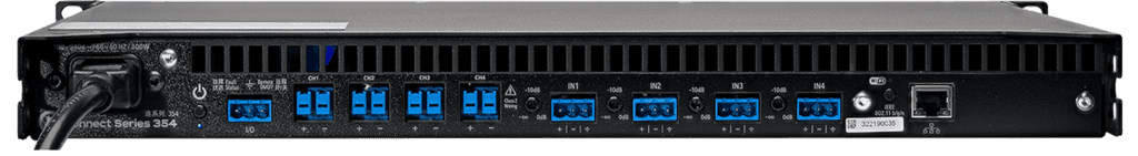 Rackmount amplifier rear panel with multiple inputs/outputs.